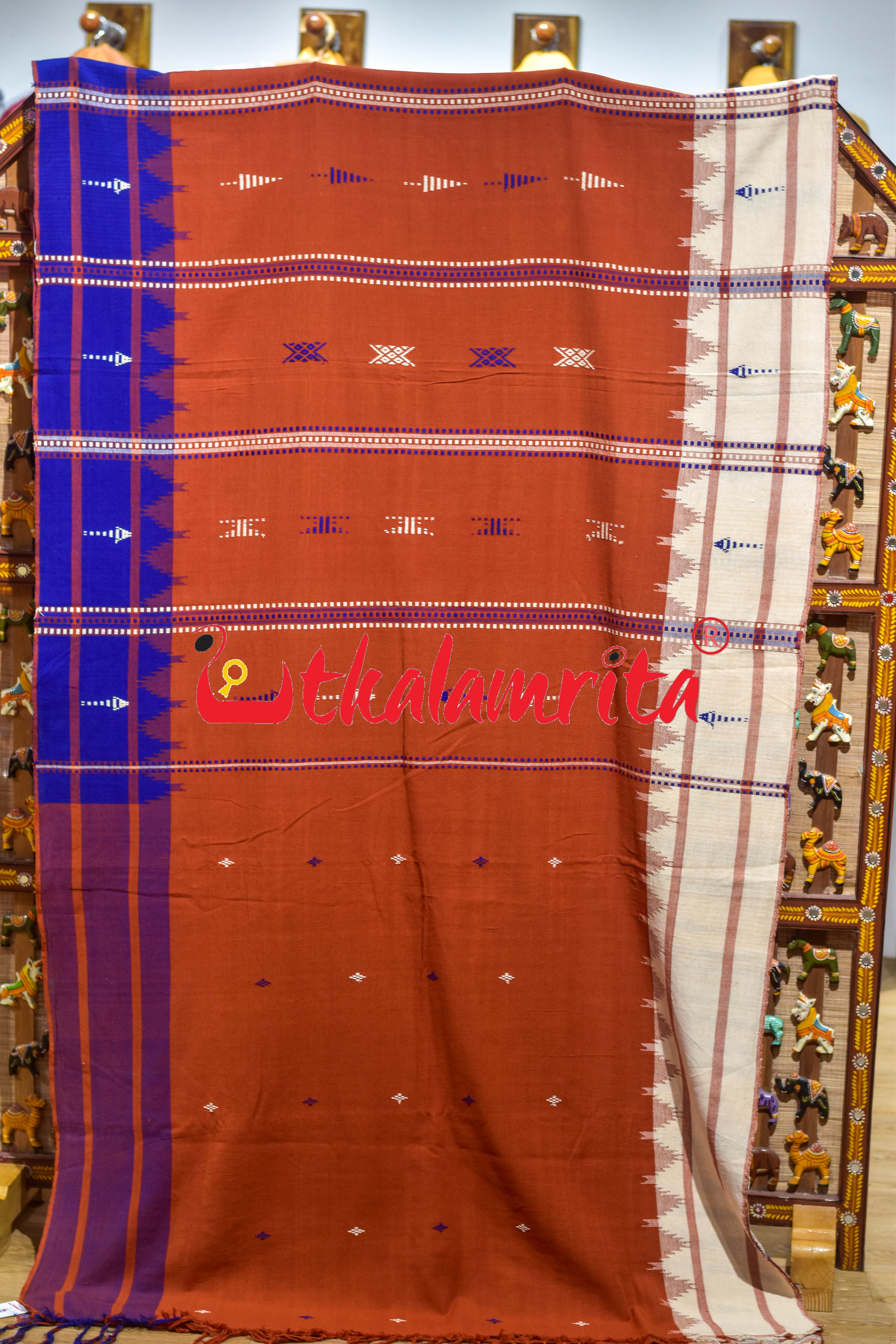 Rust Body Blue Adibasi Double Border Kotpad Cotton Saree