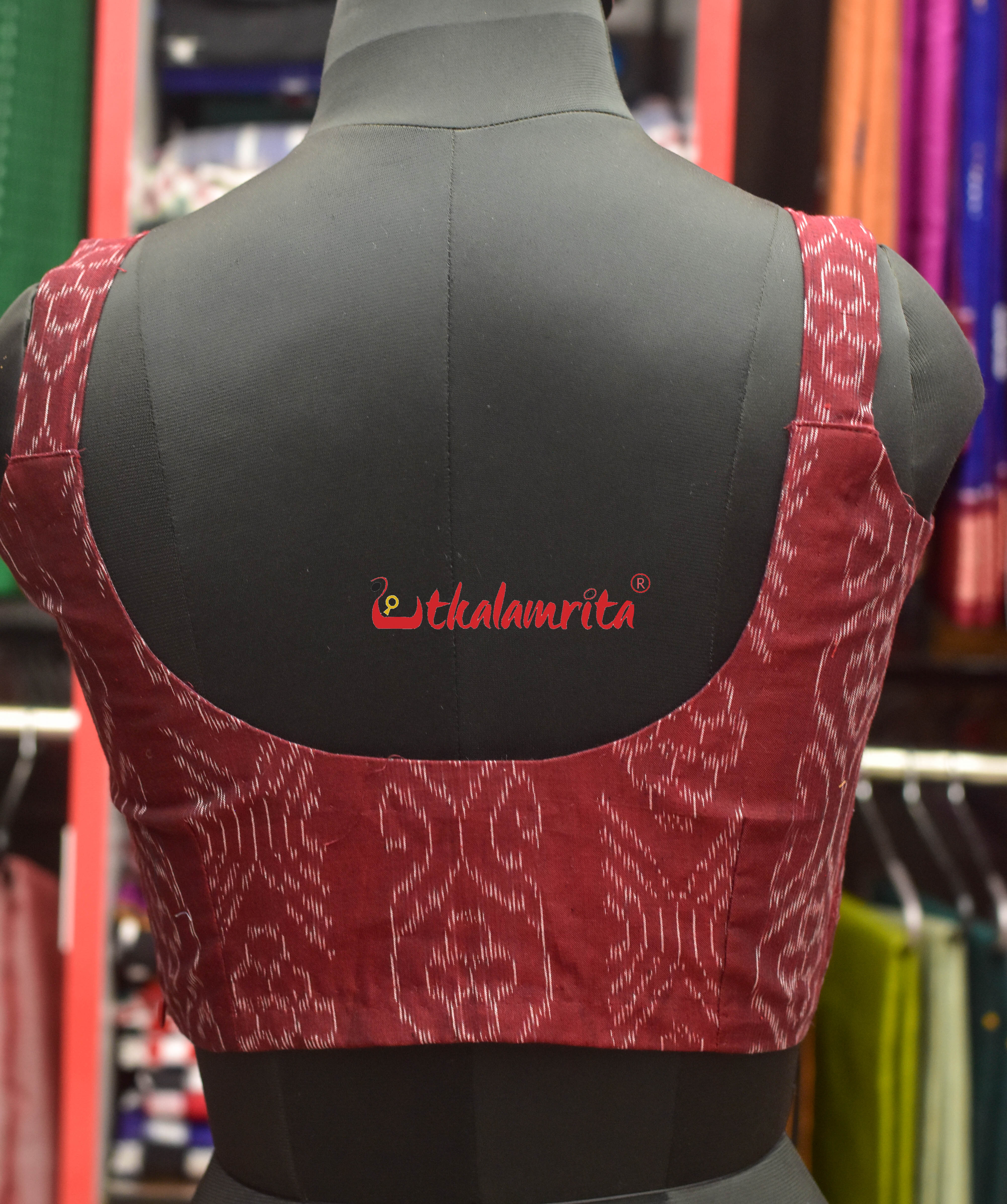 Flower Bandha on Maroon Sleeveless (Blouse)