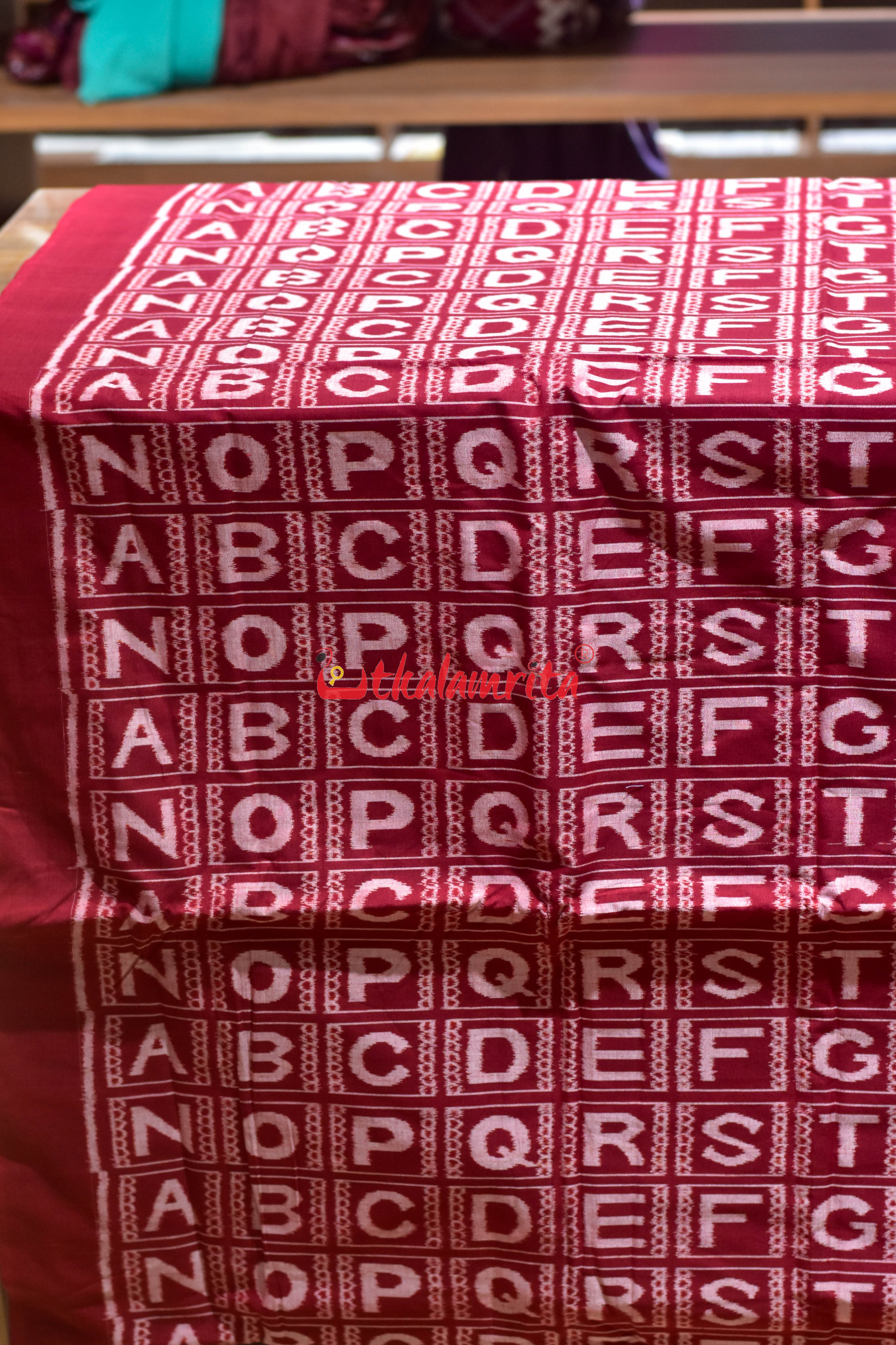 Maroon English Kothi Alphabets Cotton (Fabric)