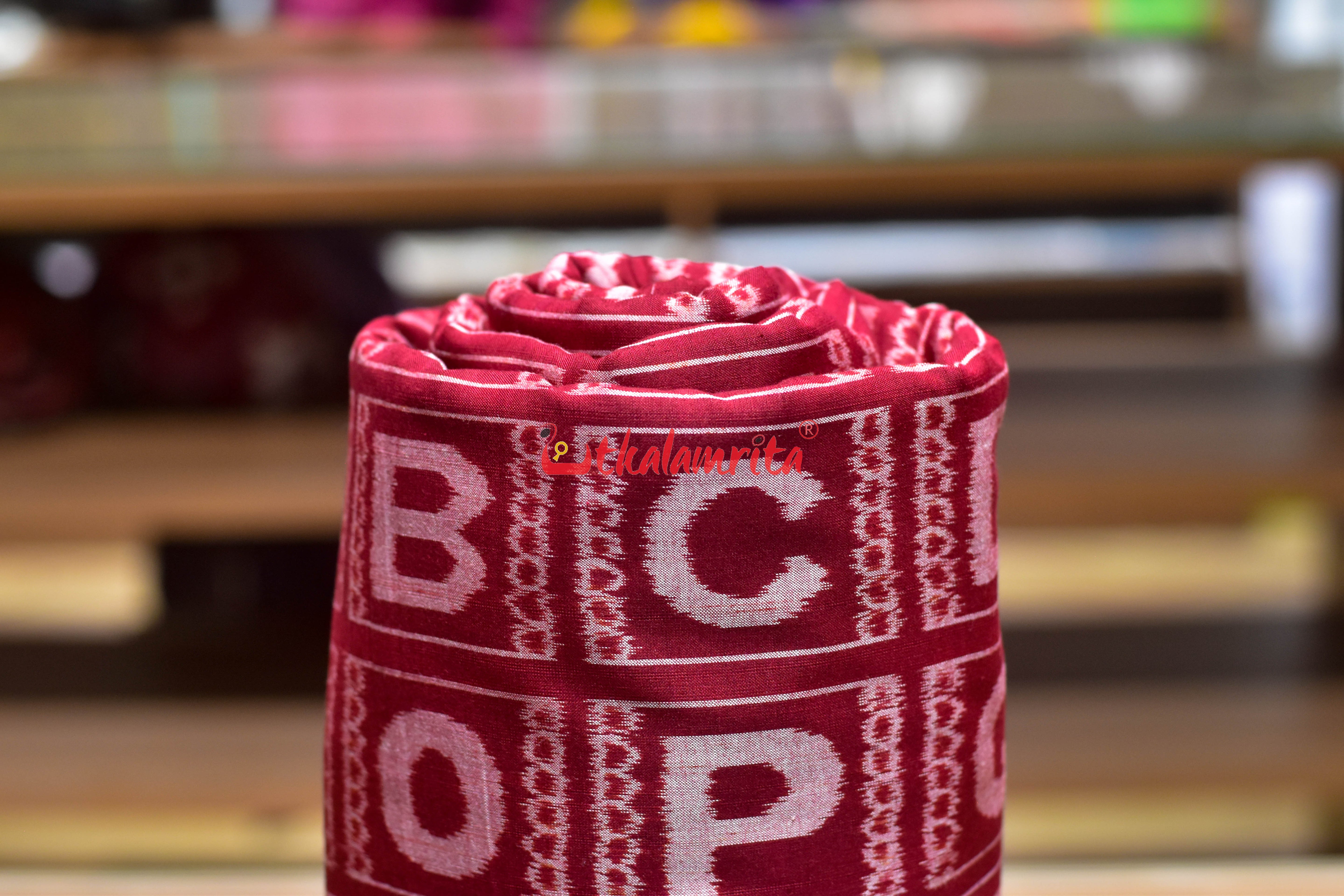 Maroon English Kothi Alphabets Cotton (Fabric)