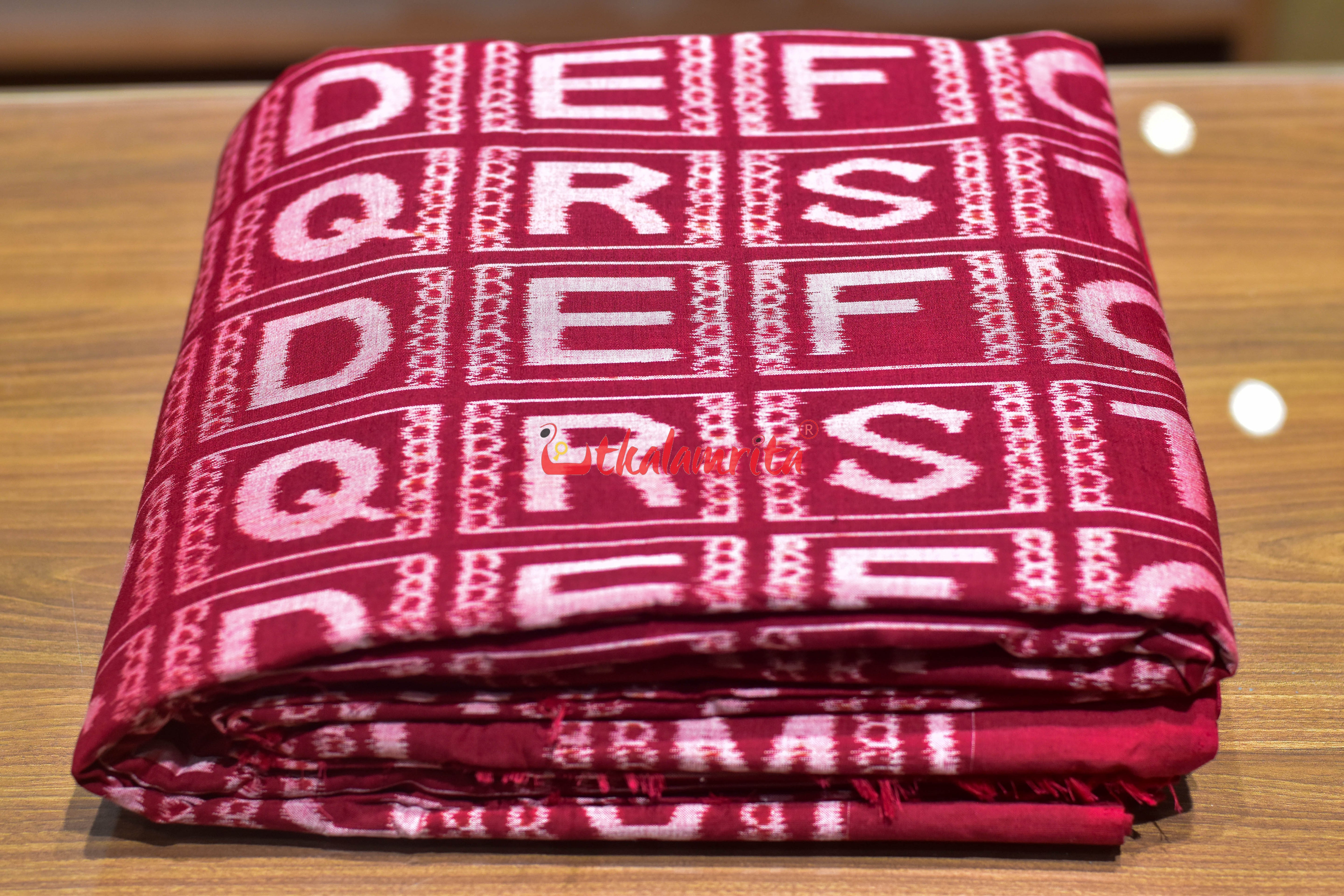 Maroon English Kothi Alphabets Cotton (Fabric)