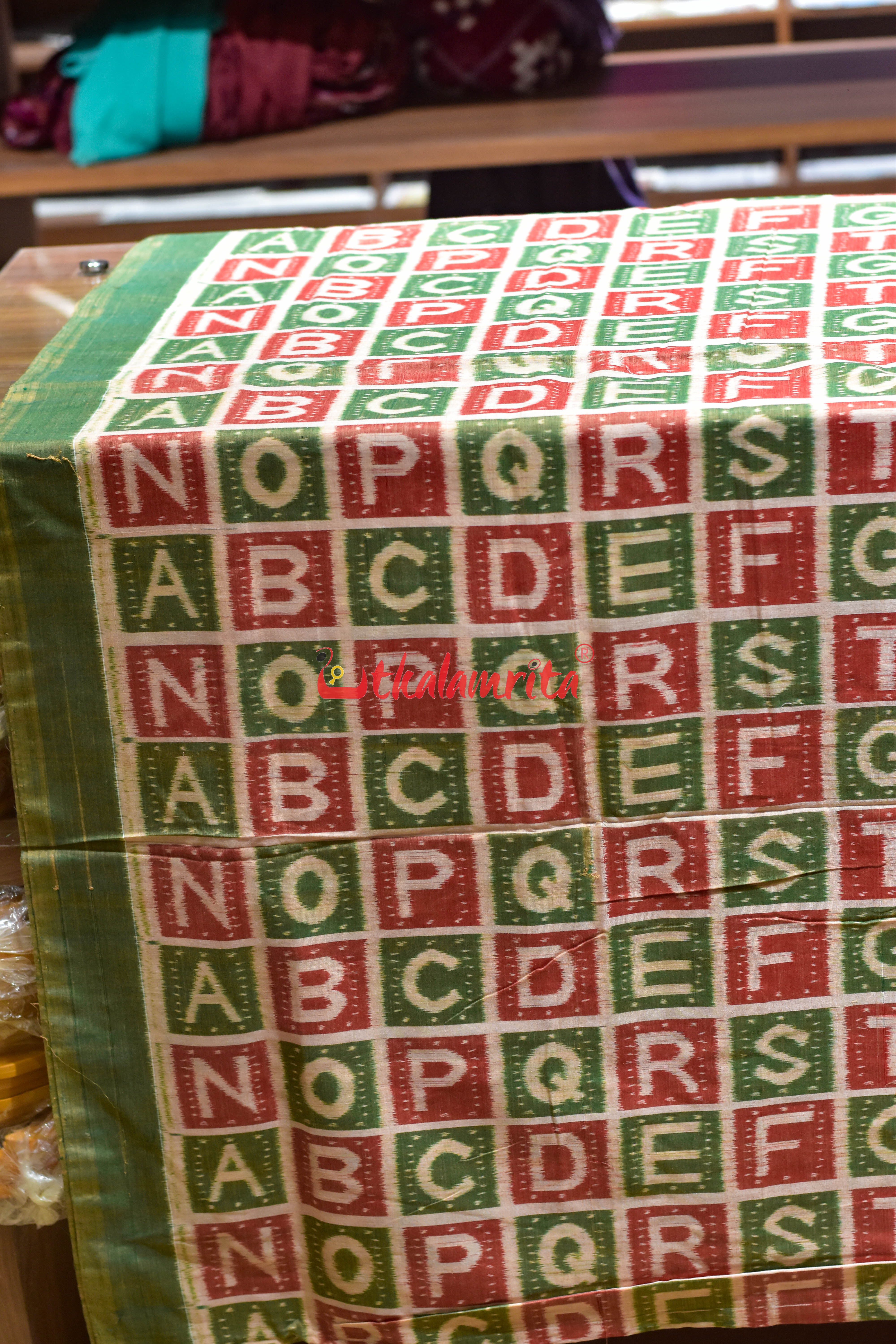 Matha Green Red English Alphabets Cotton (Fabric)