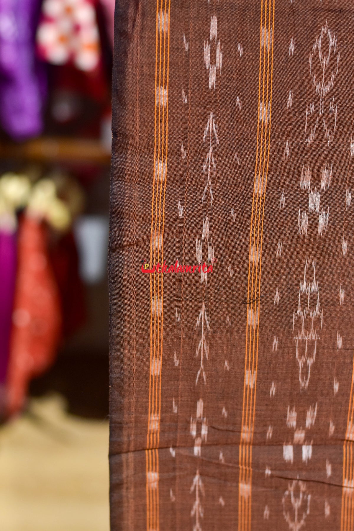 brown fish with flower ikat (fabric)