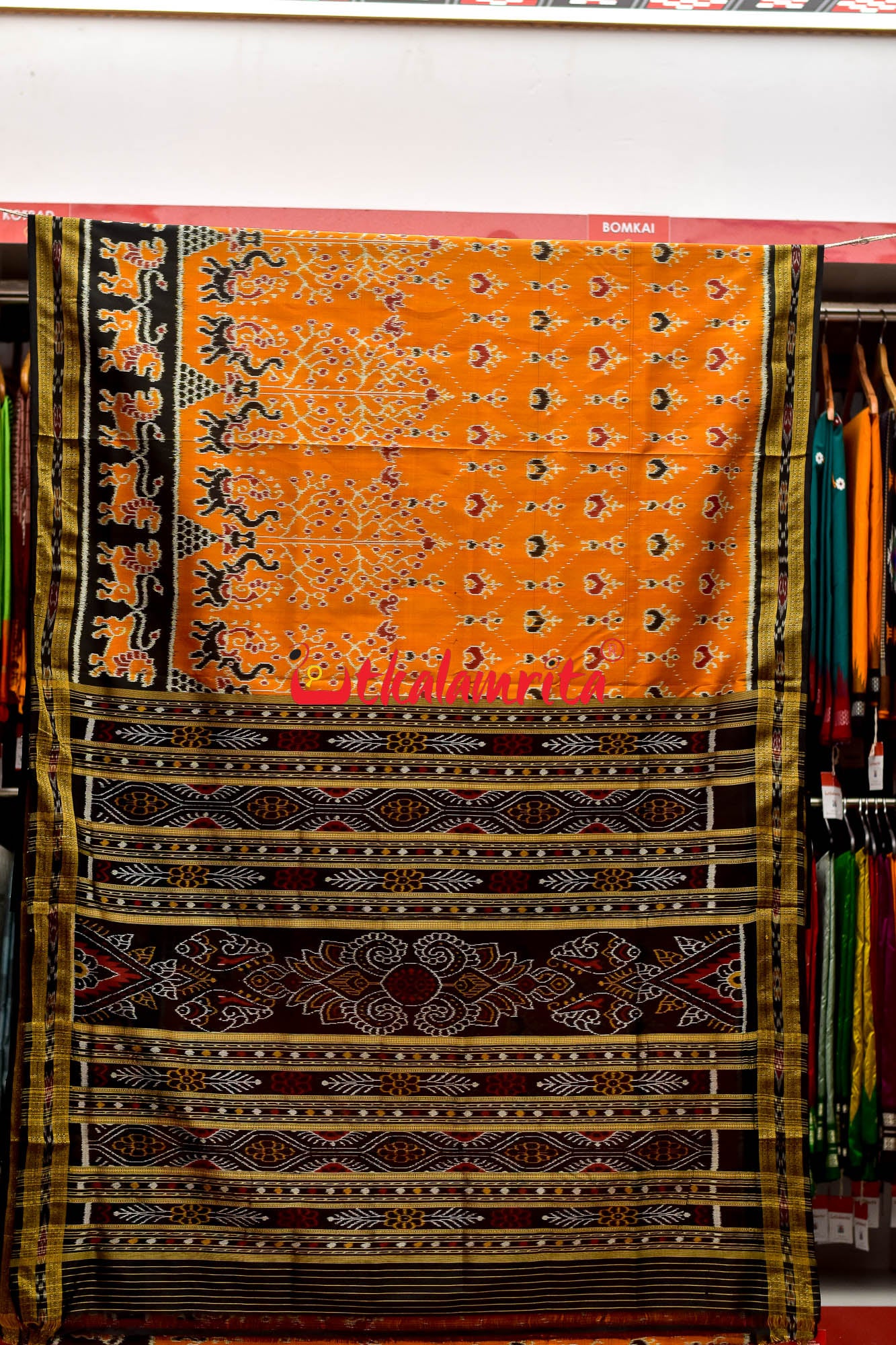 Orange Mammoth Lion Border Khandua Silk Saree