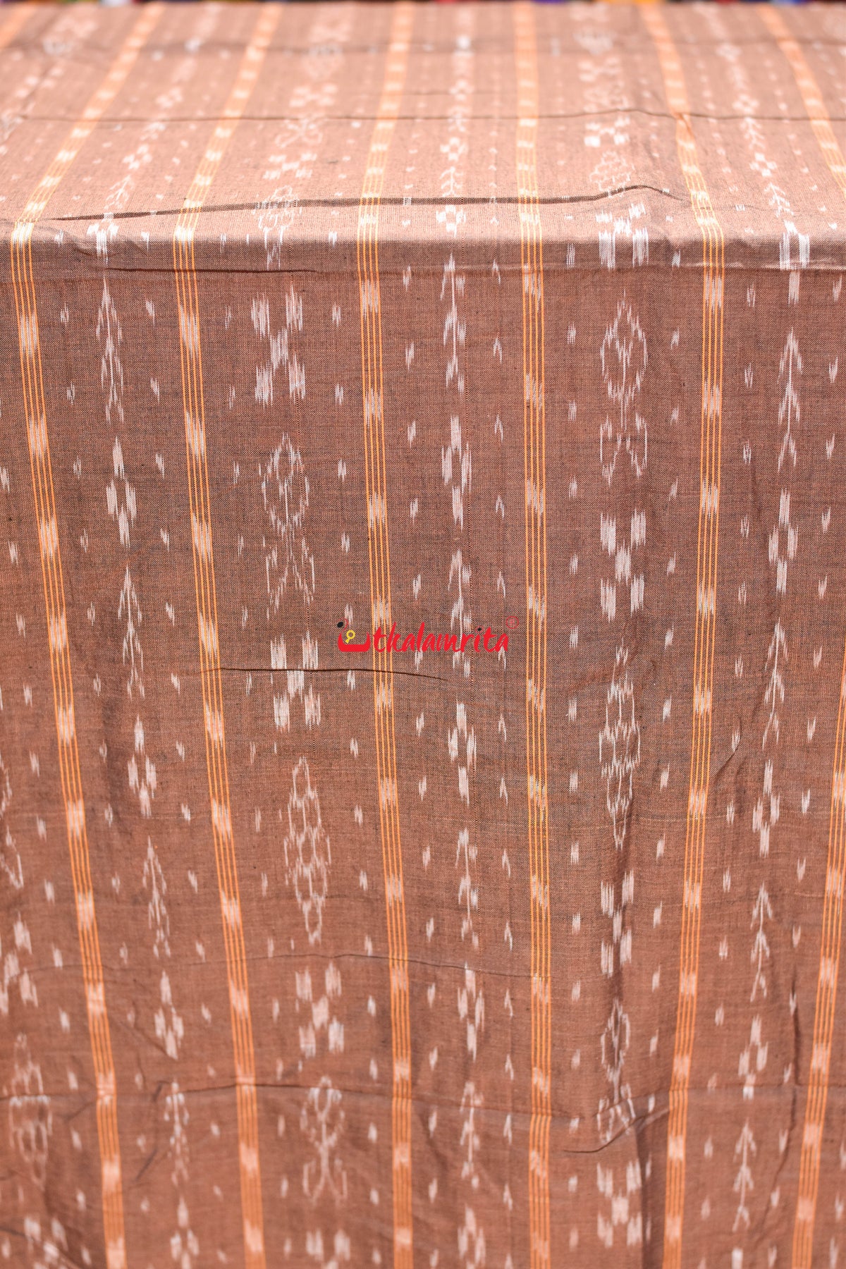 brown fish with flower ikat (fabric)