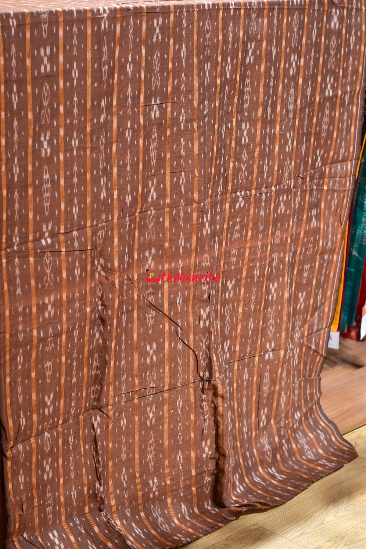 brown fish with flower ikat (fabric)