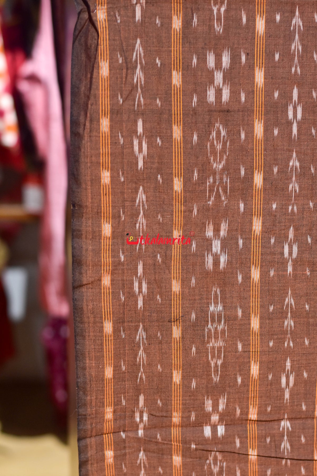 brown fish with flower ikat (fabric)