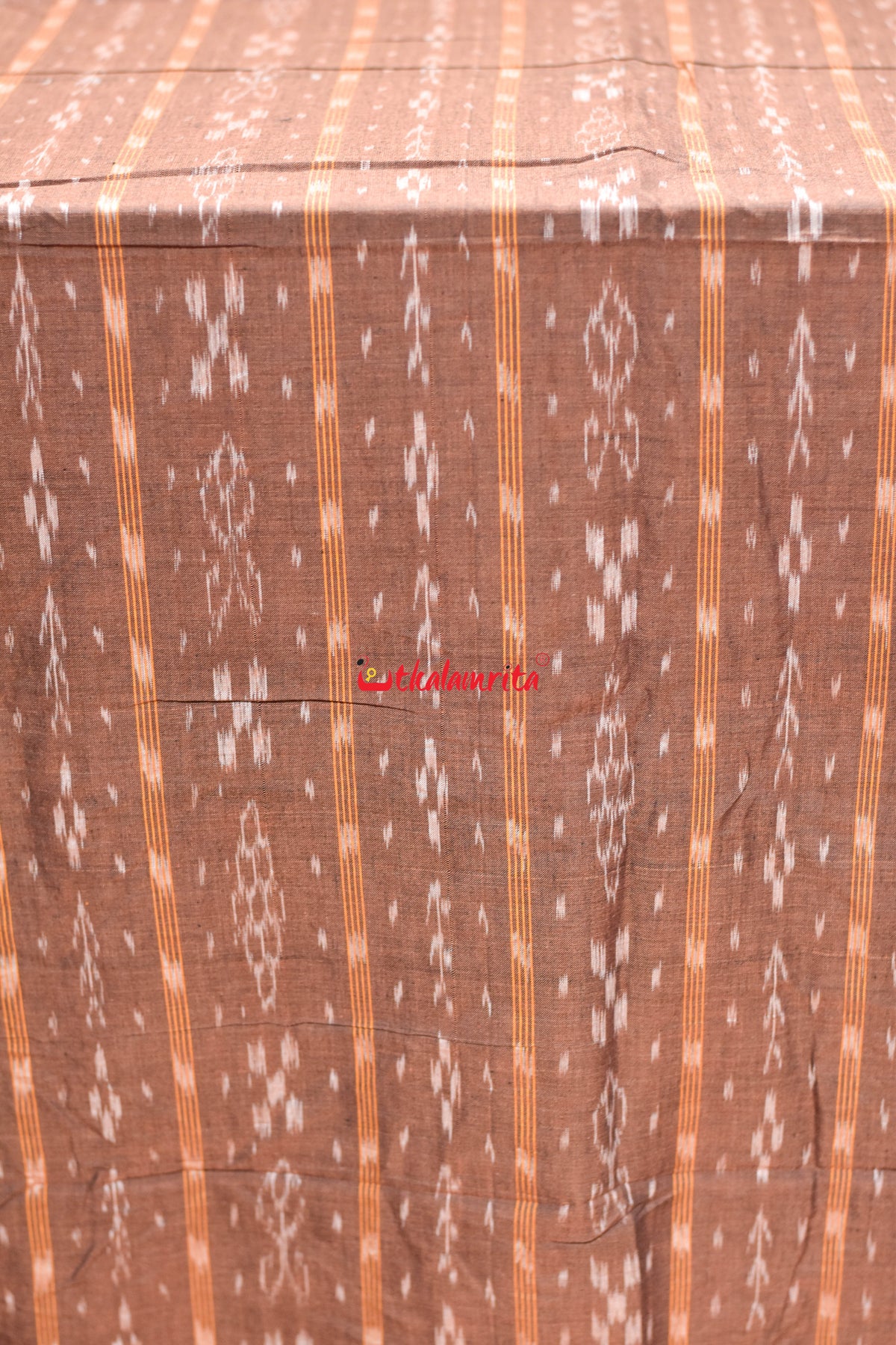 brown fish with flower ikat (fabric)