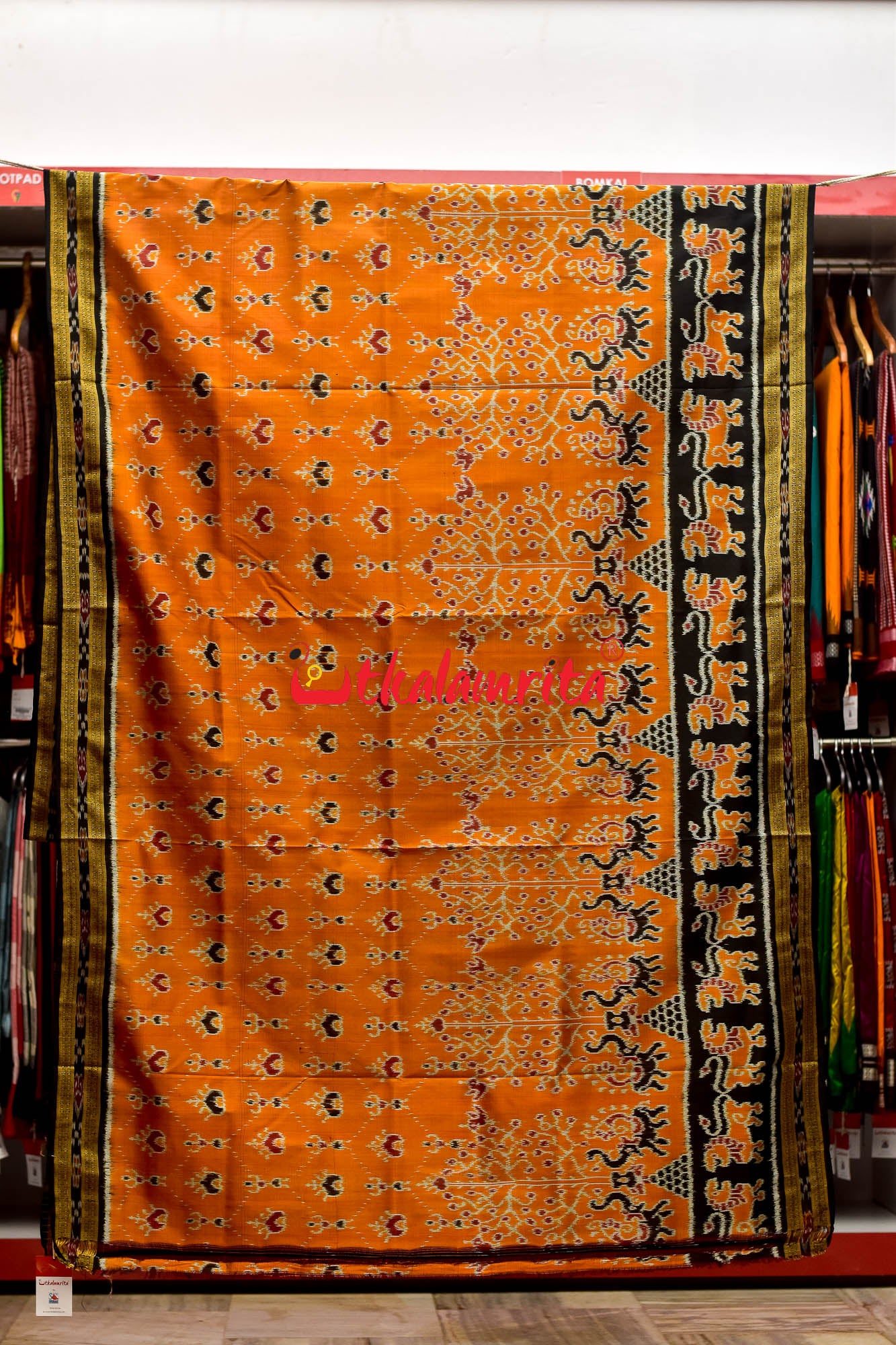Orange Mammoth Lion Border Khandua Silk Saree