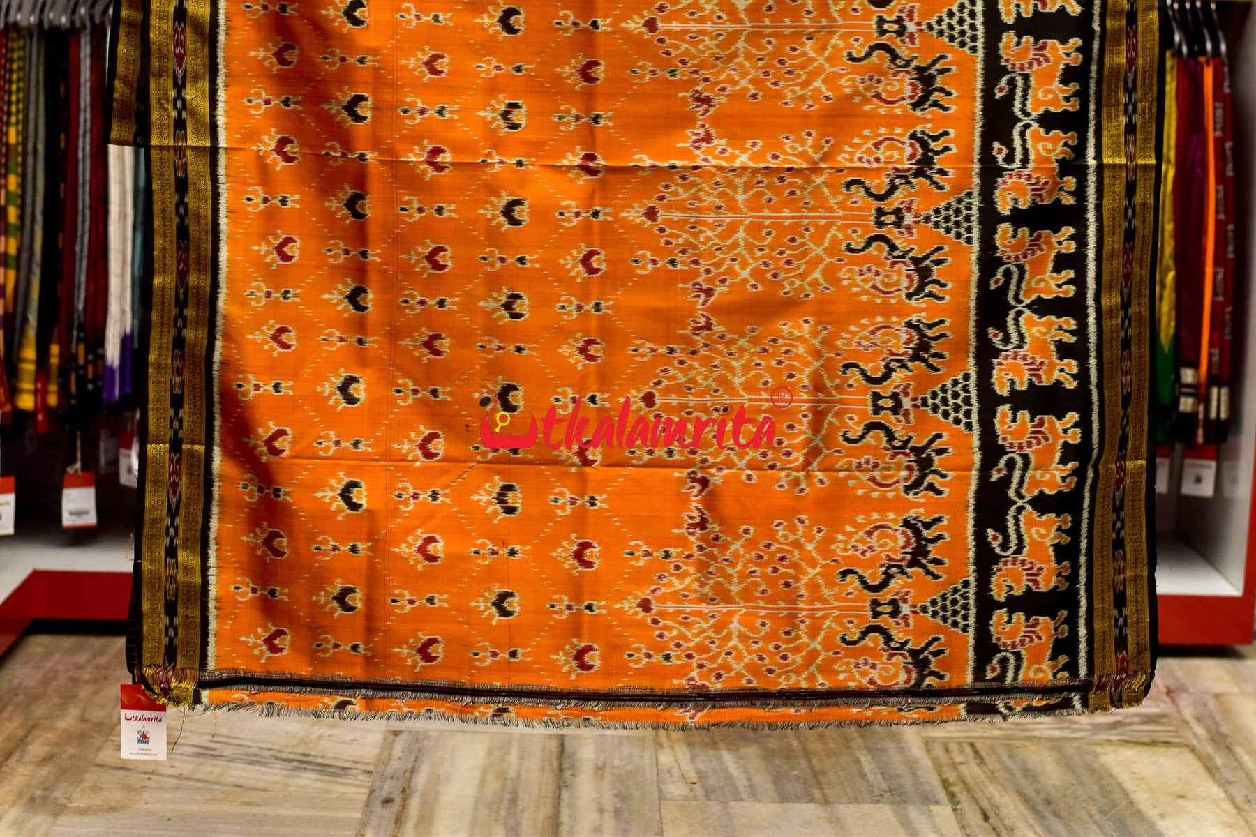 Orange Mammoth Lion Border Khandua Silk Saree