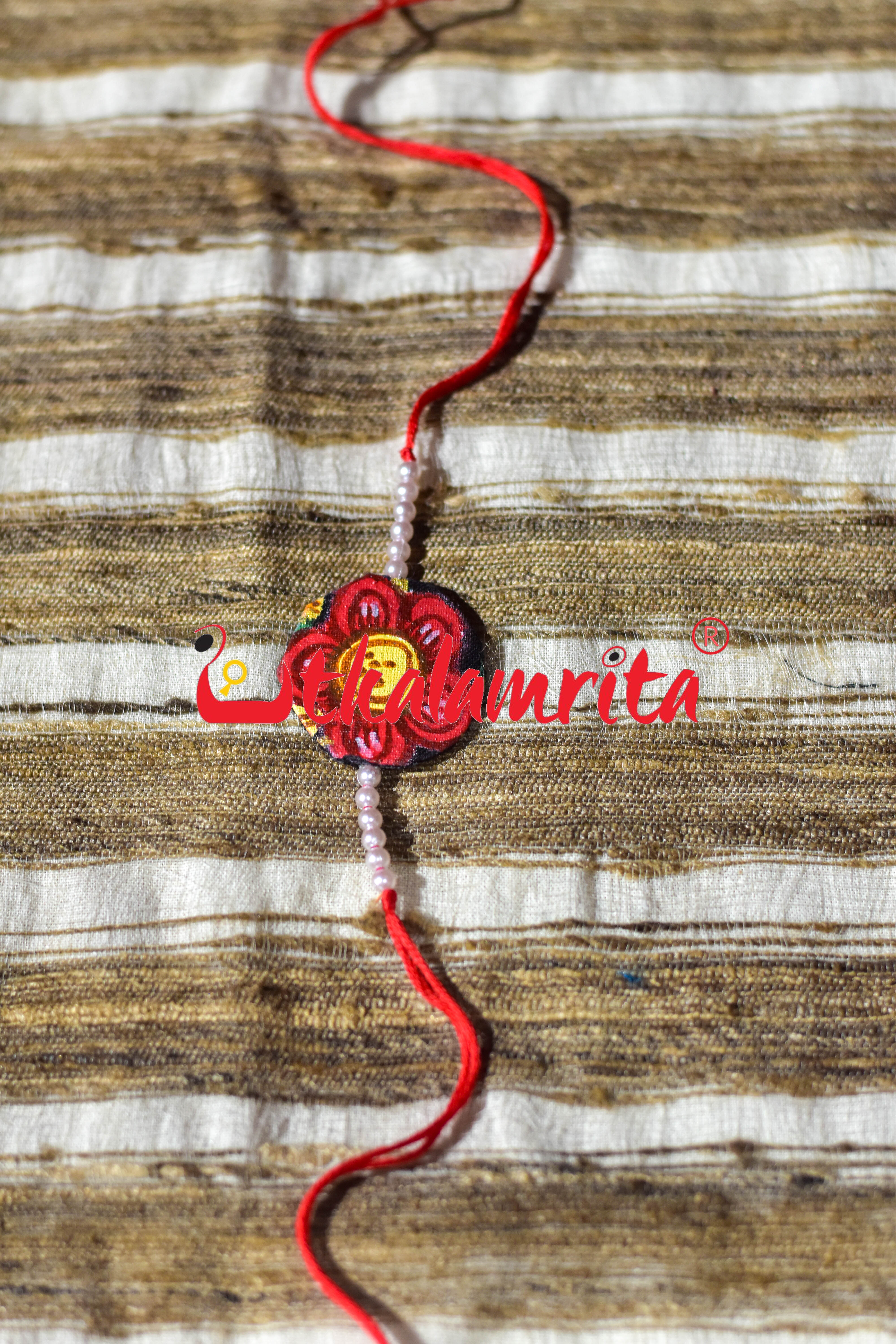 Black Round Flower Pattachitra (Ikat Rakhi)