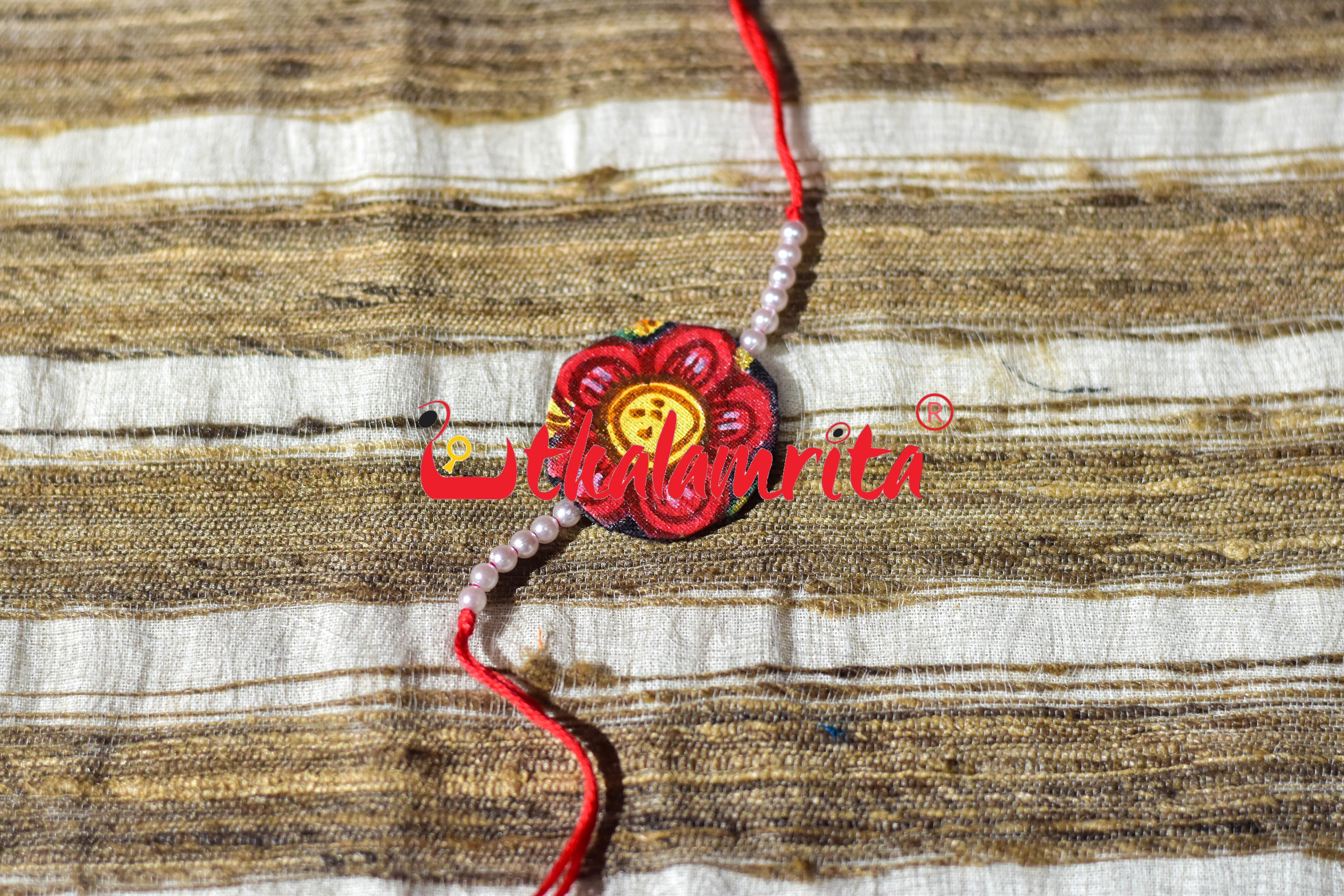 Black Round Flower Pattachitra (Ikat Rakhi)