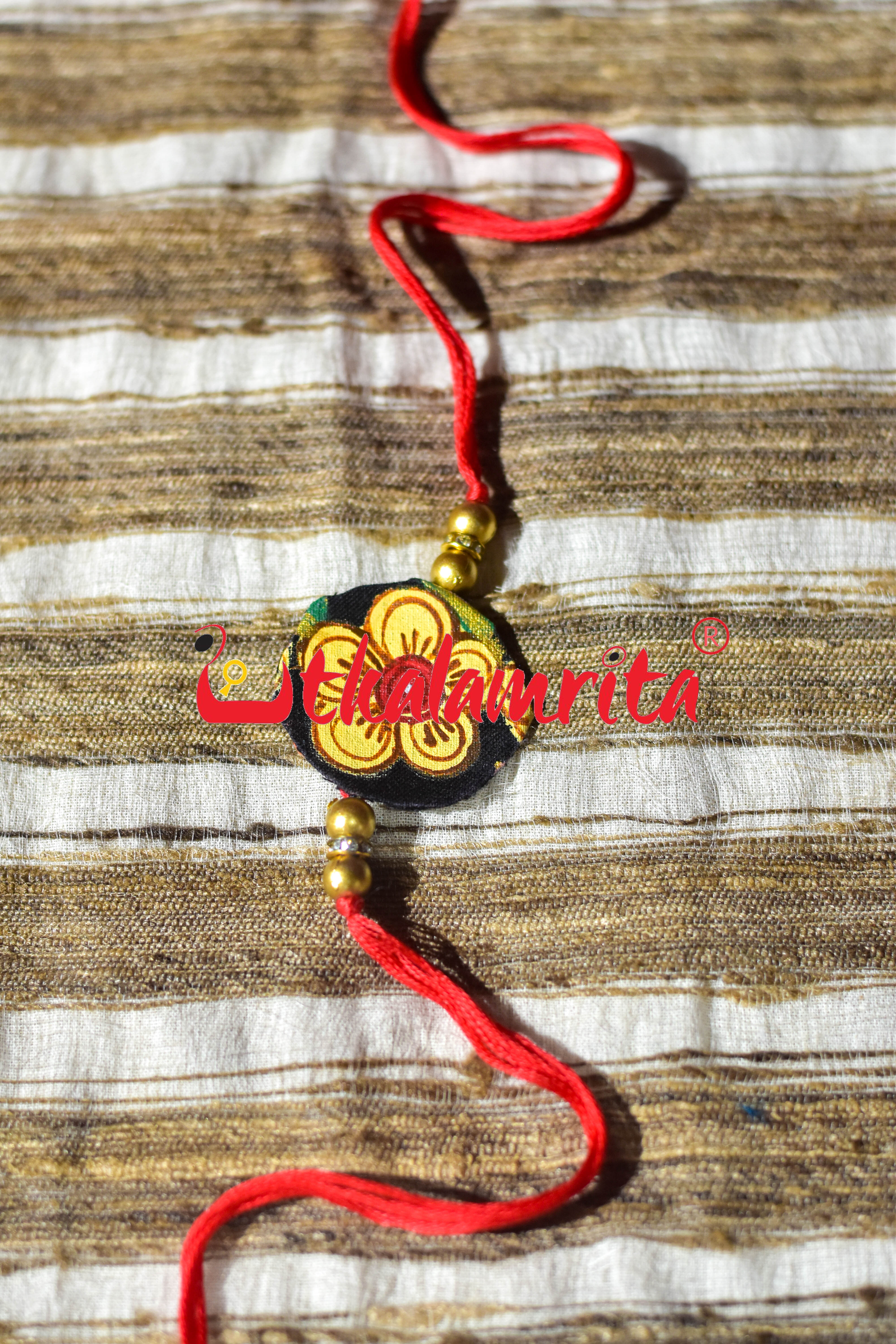 Black Round Flower Pattachitra (Ikat Rakhi)