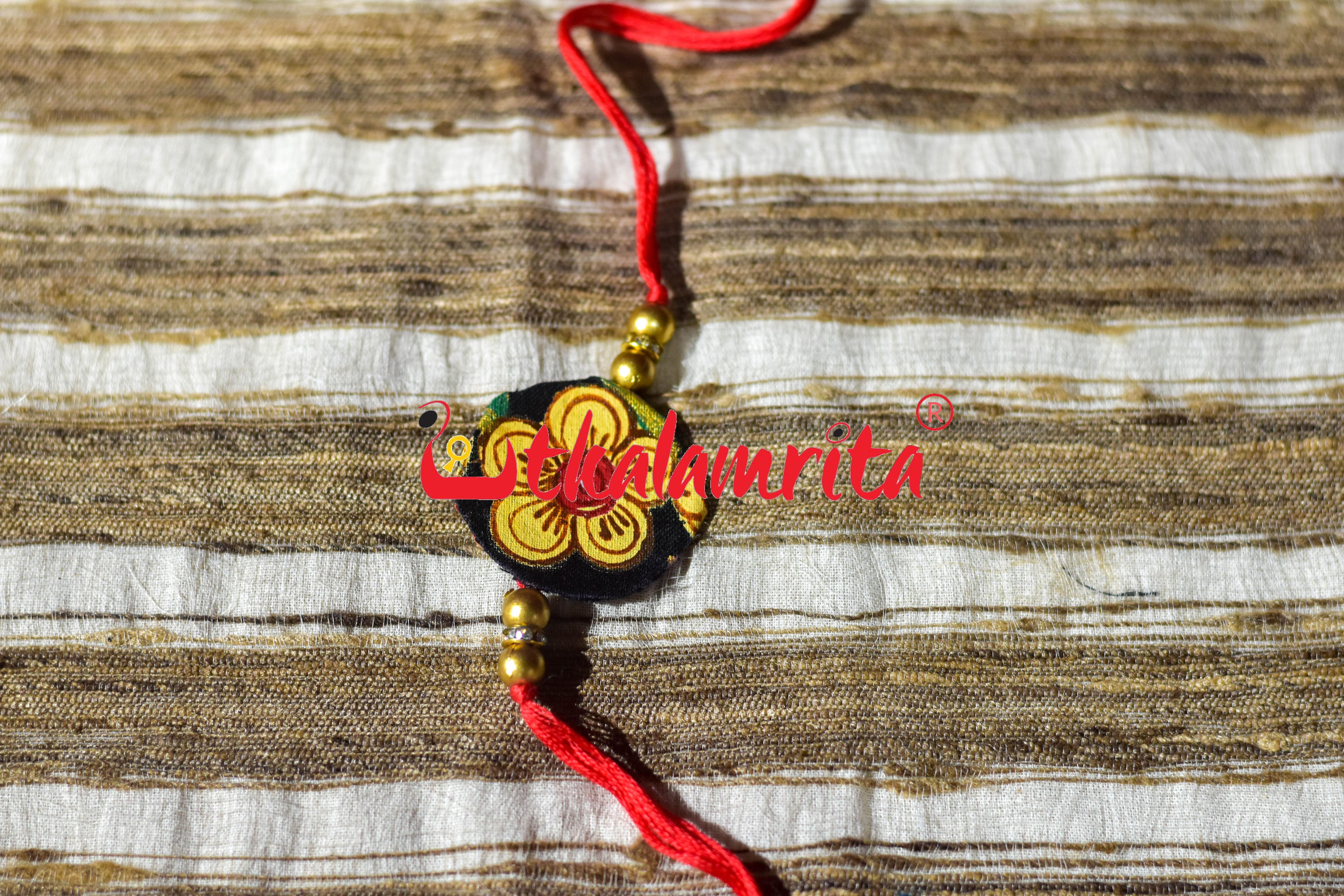 Black Round Flower Pattachitra (Ikat Rakhi)