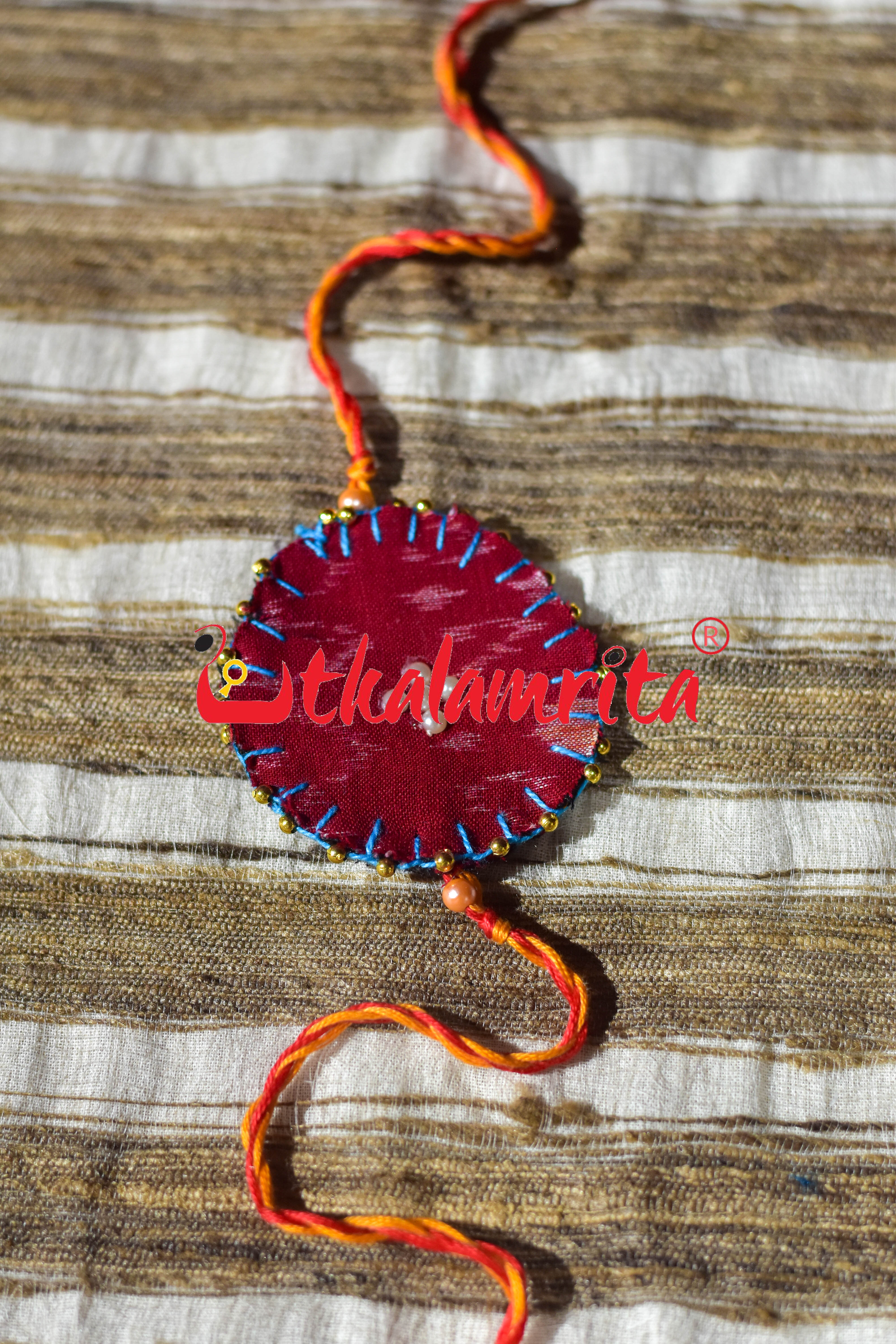Round S Bandha Red (Ikat Rakhi)