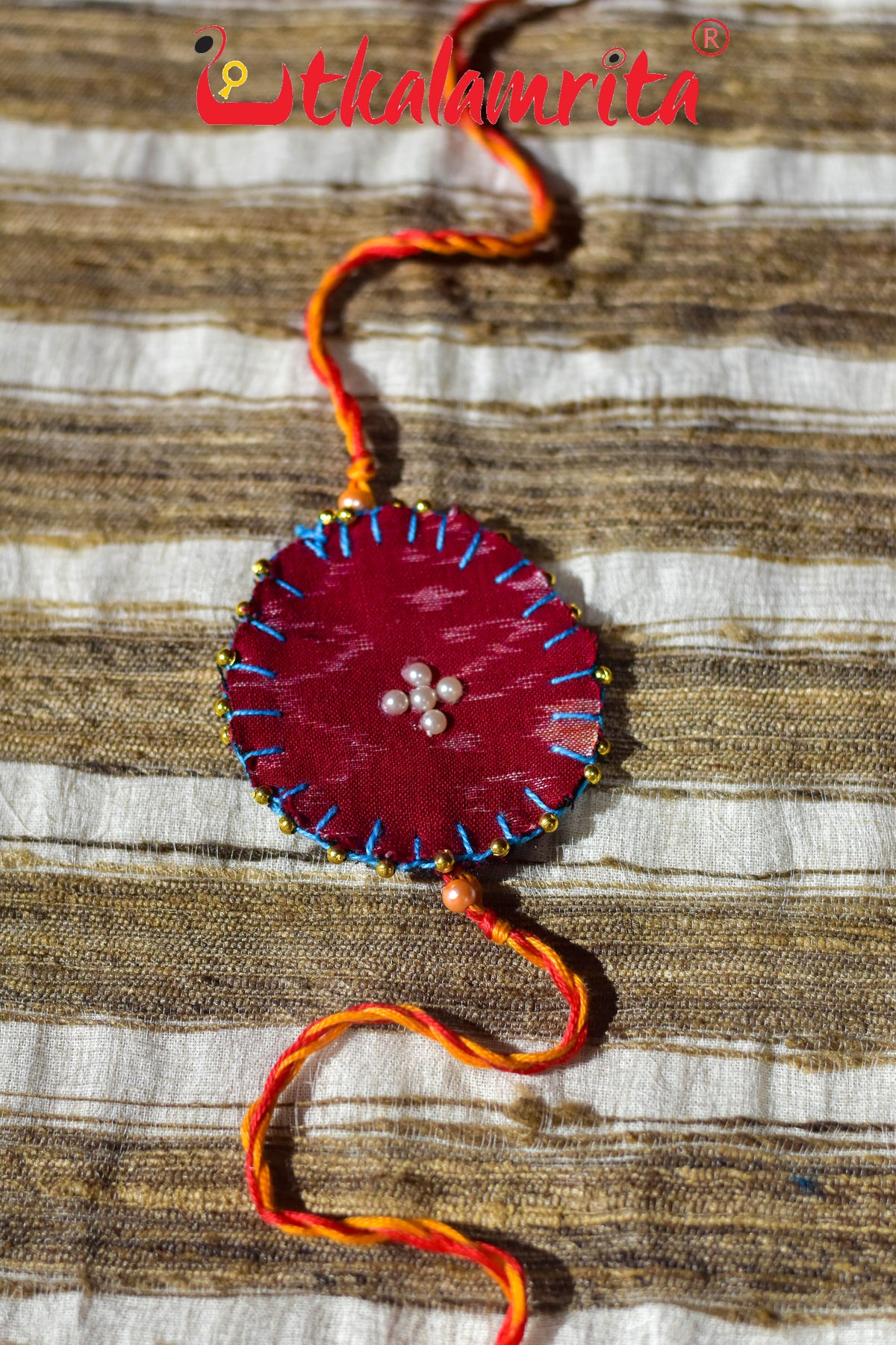 Round S Bandha Red (Ikat Rakhi)