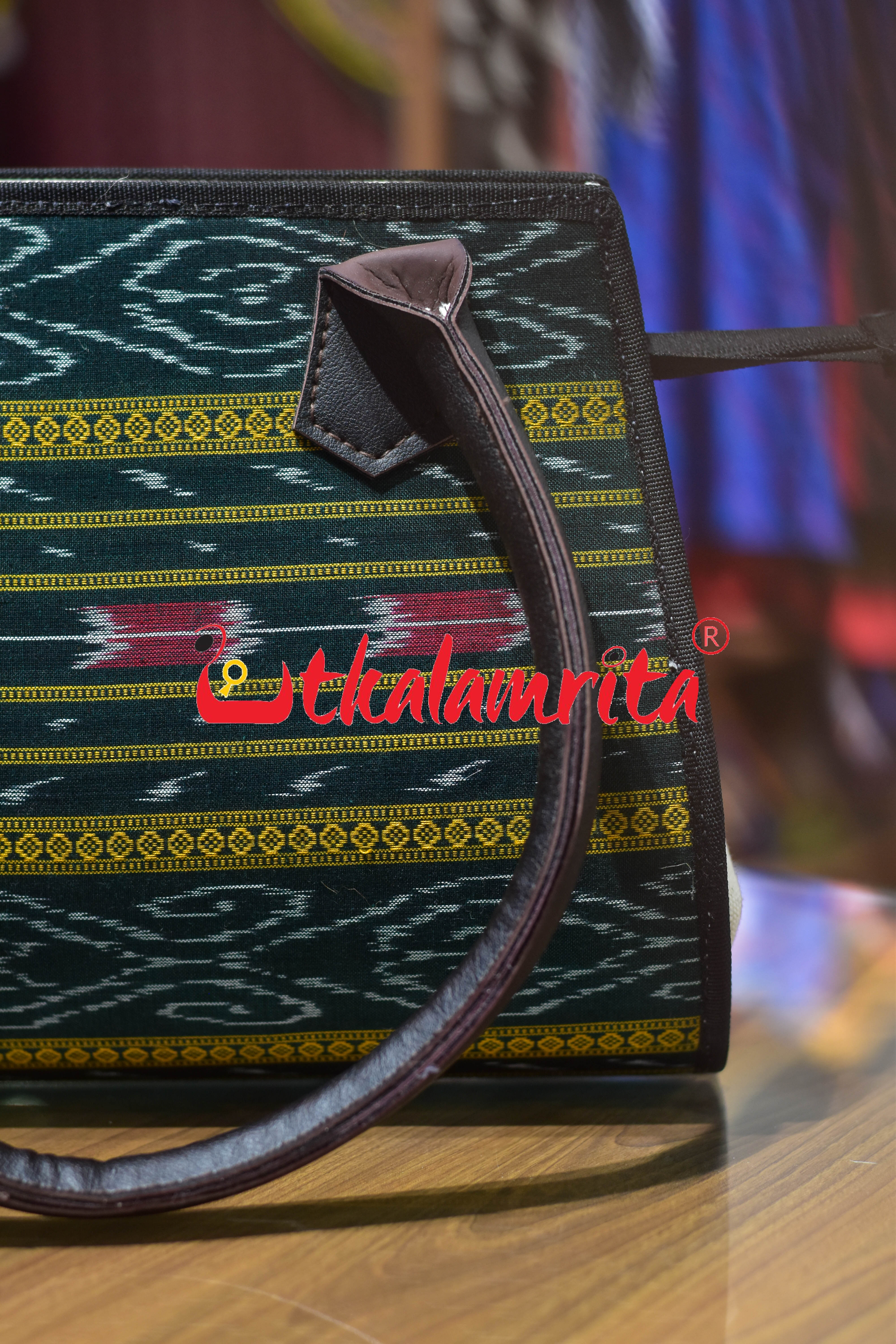 Green Anjimala Trapezium Vanity Bag