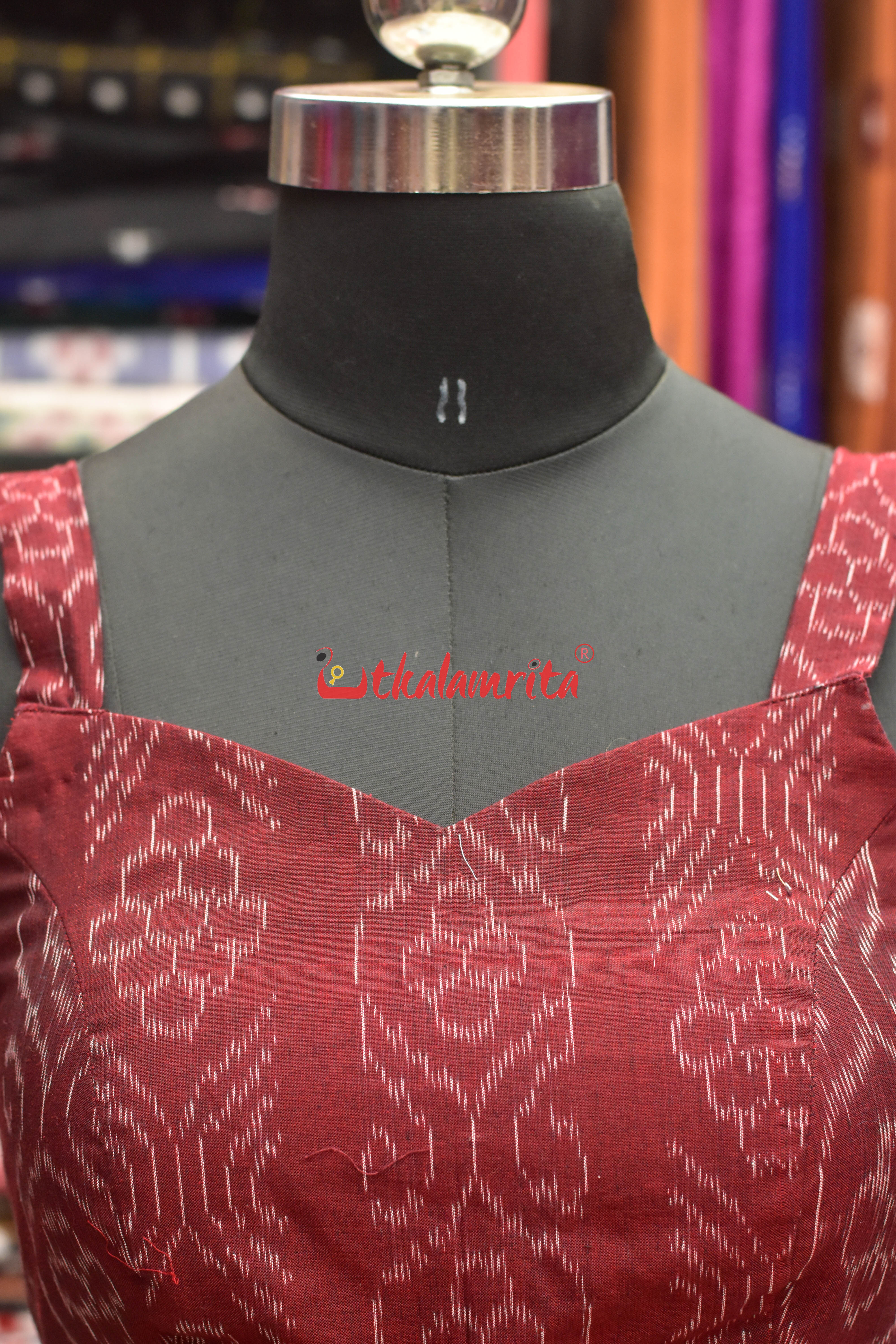 Flower Bandha on Maroon Sleeveless (Blouse)