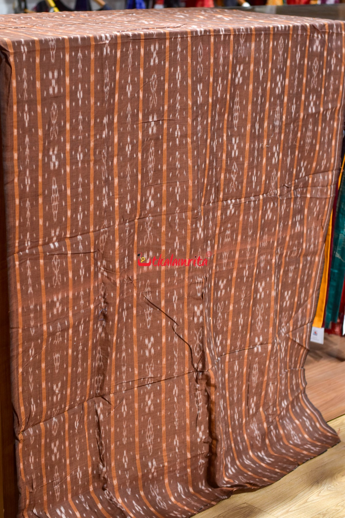 brown fish with flower ikat (fabric)