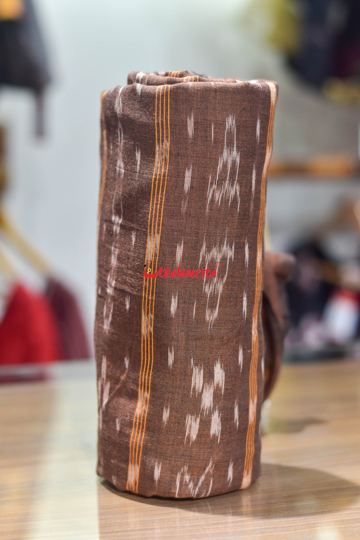 brown fish with flower ikat (fabric)