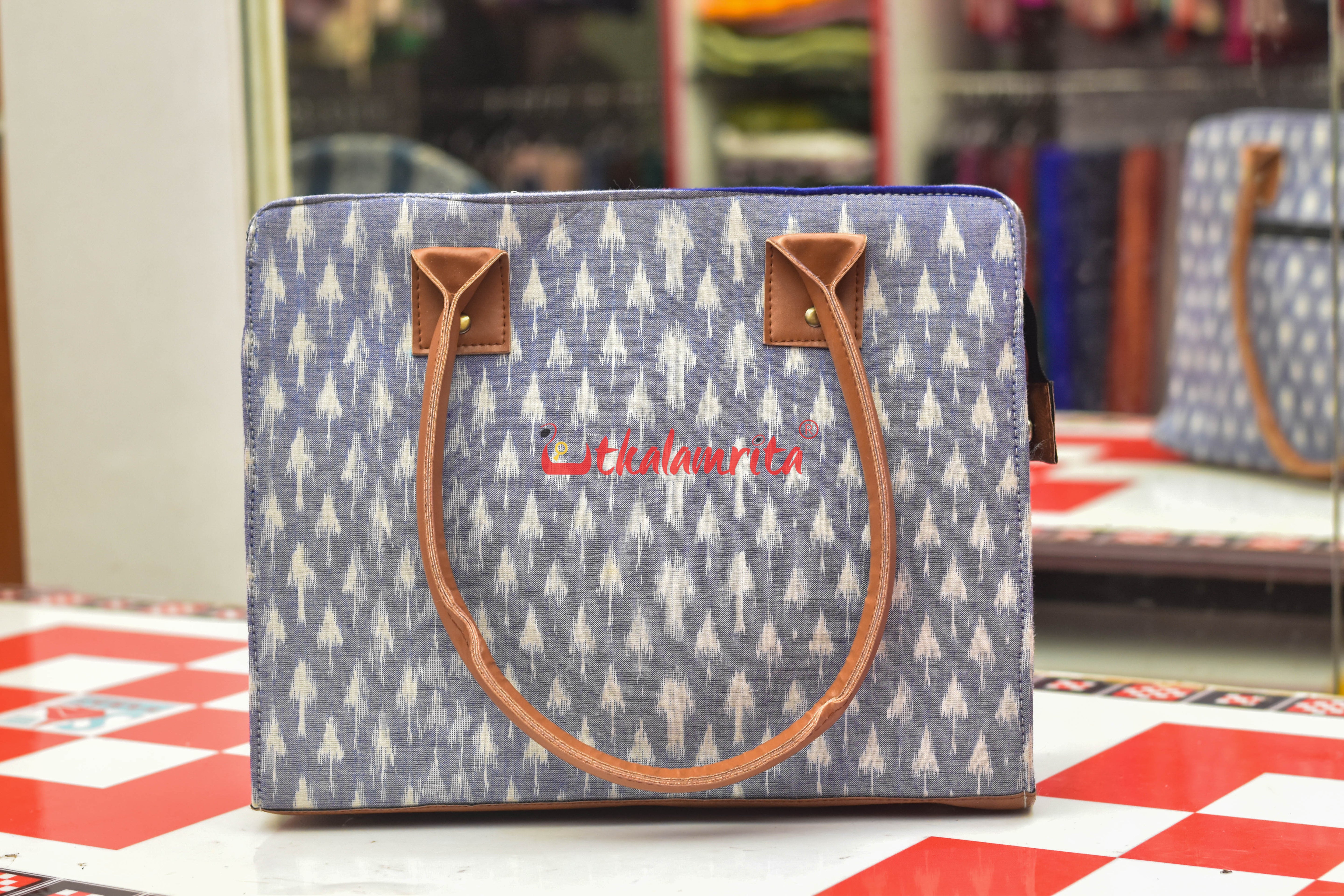 Chhatu Golden Over Blue Vanity Bag