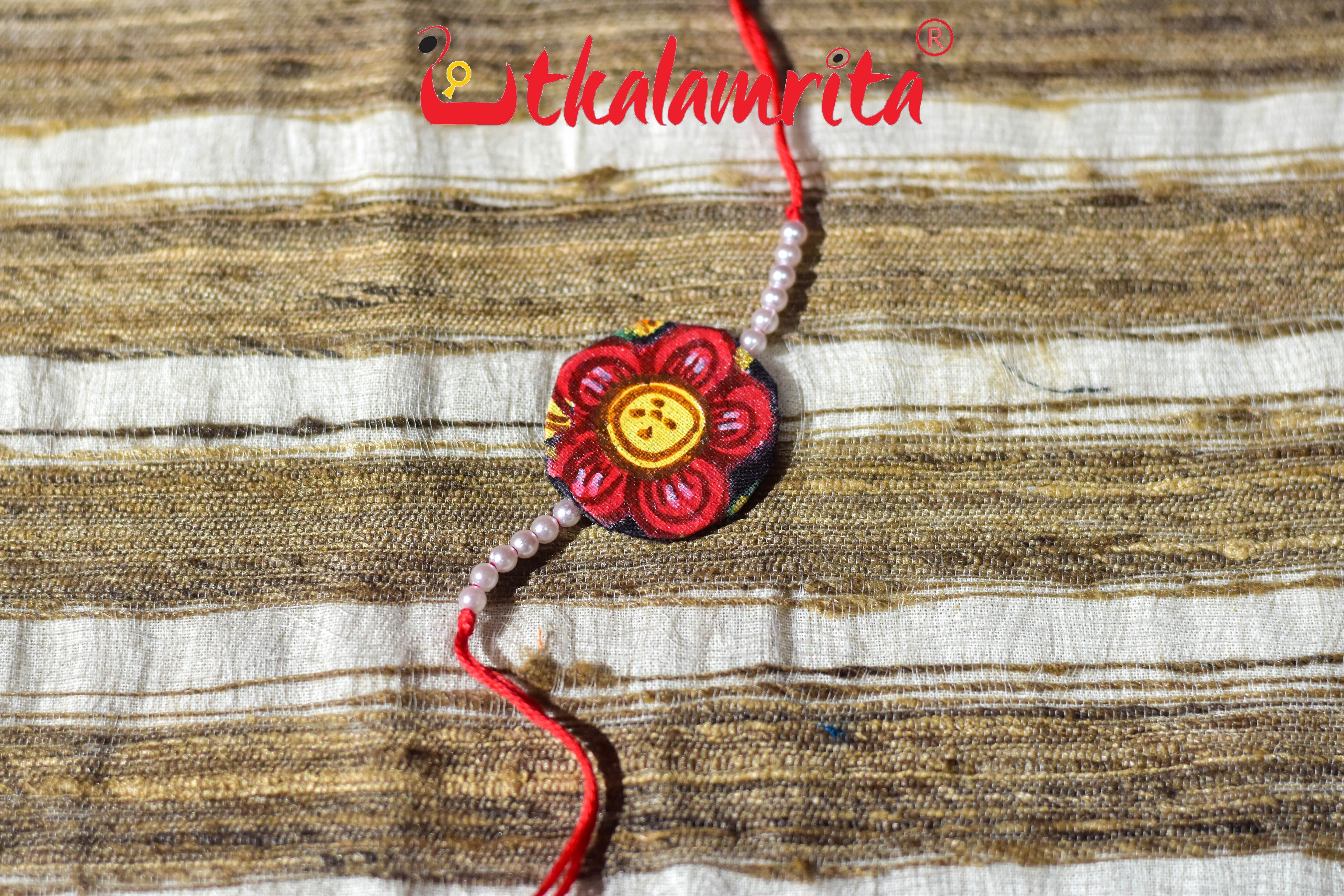 Black Round Flower Pattachitra (Ikat Rakhi)