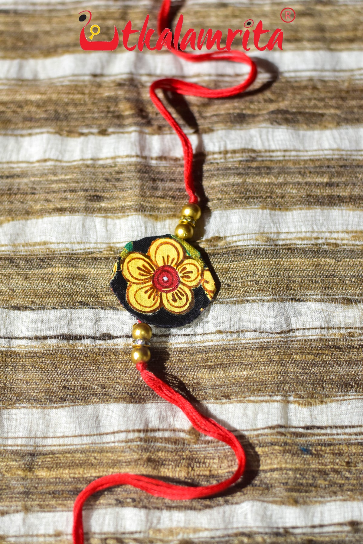 Black Round Flower Pattachitra (Ikat Rakhi)