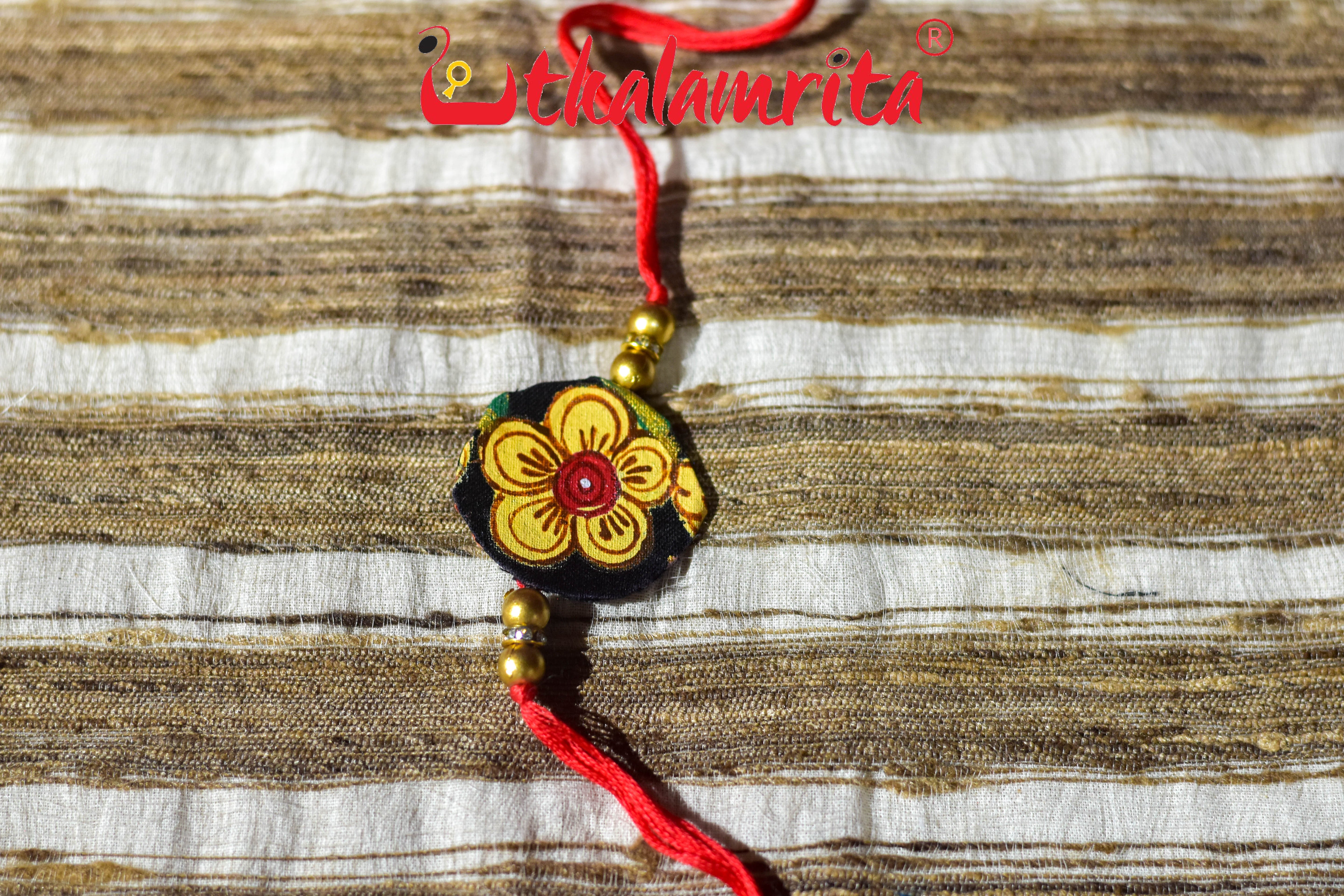 Black Round Flower Pattachitra (Ikat Rakhi)