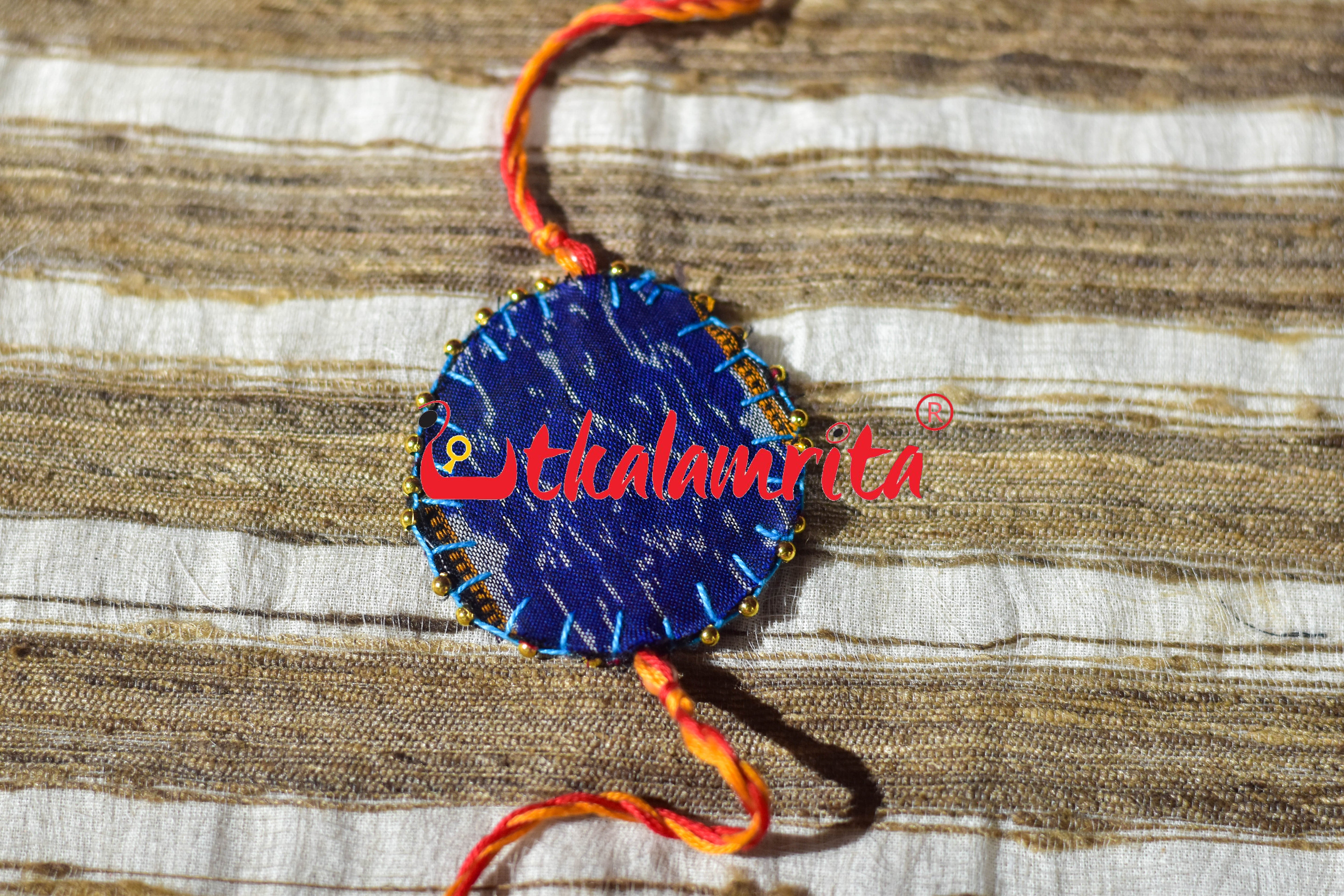 Round S Bandha Red (Ikat Rakhi)