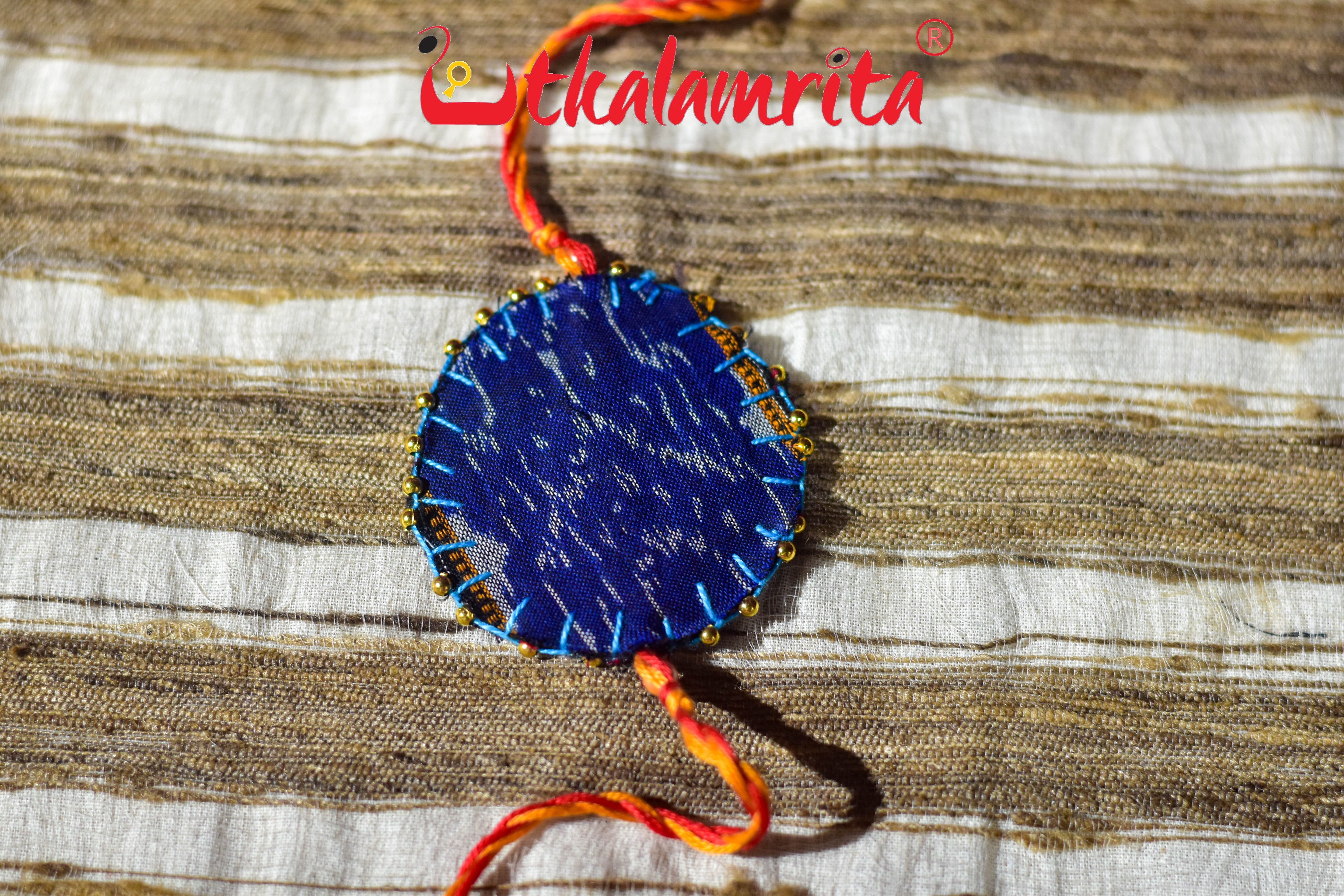 Round S Bandha Red (Ikat Rakhi)