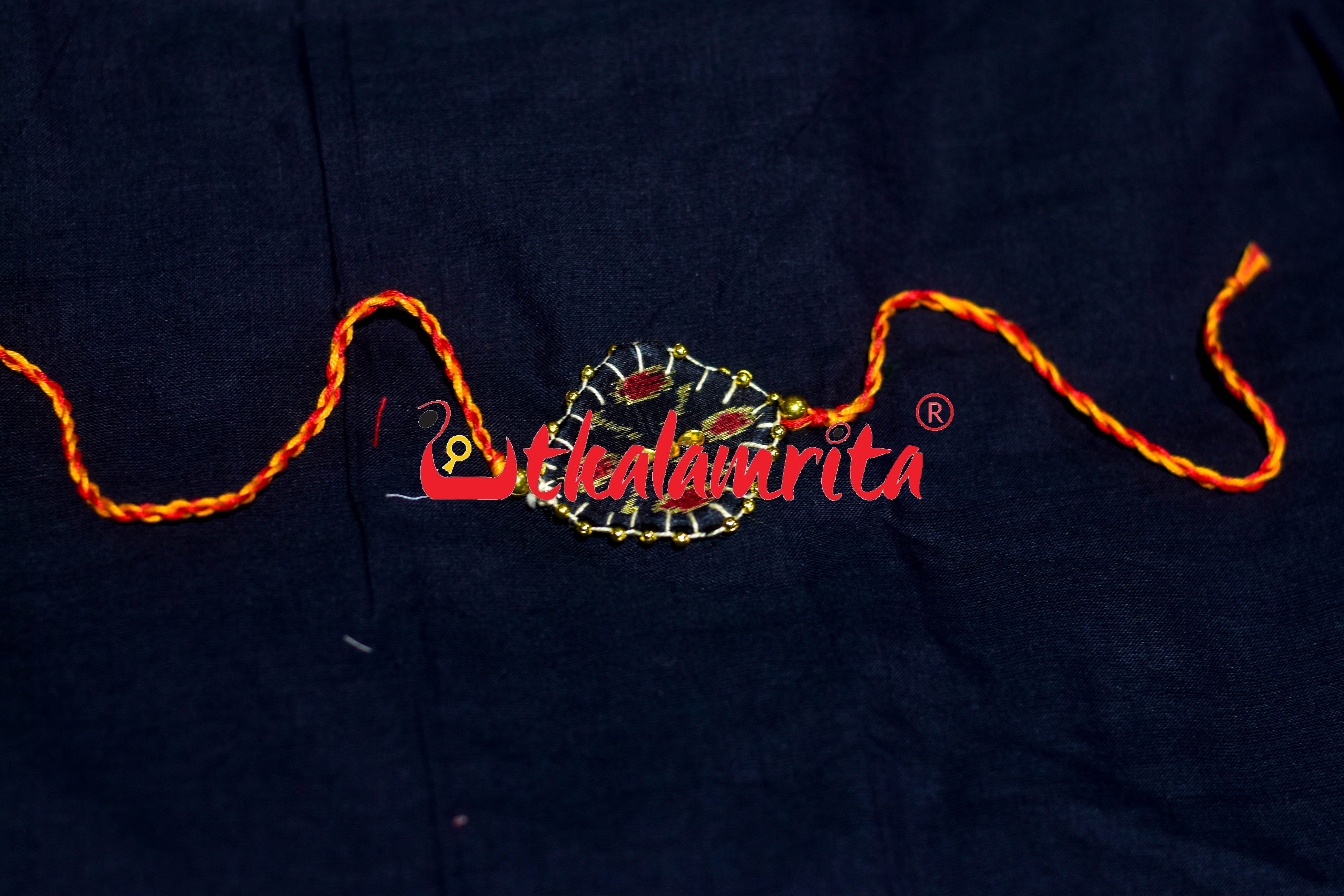 Black Chandrika Golden Mali (Ikat Rakhi)