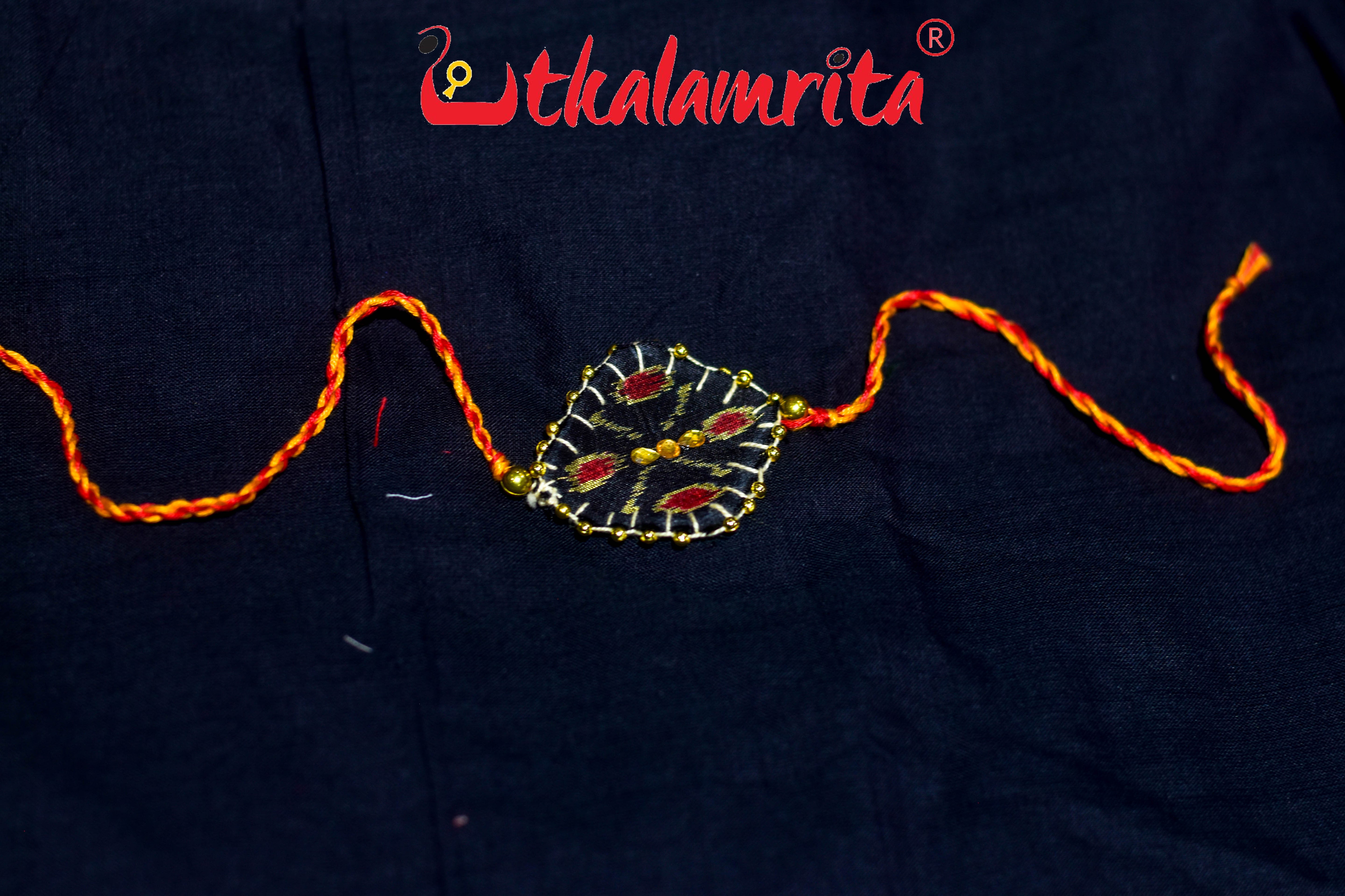 Black Chandrika Golden Mali (Ikat Rakhi)