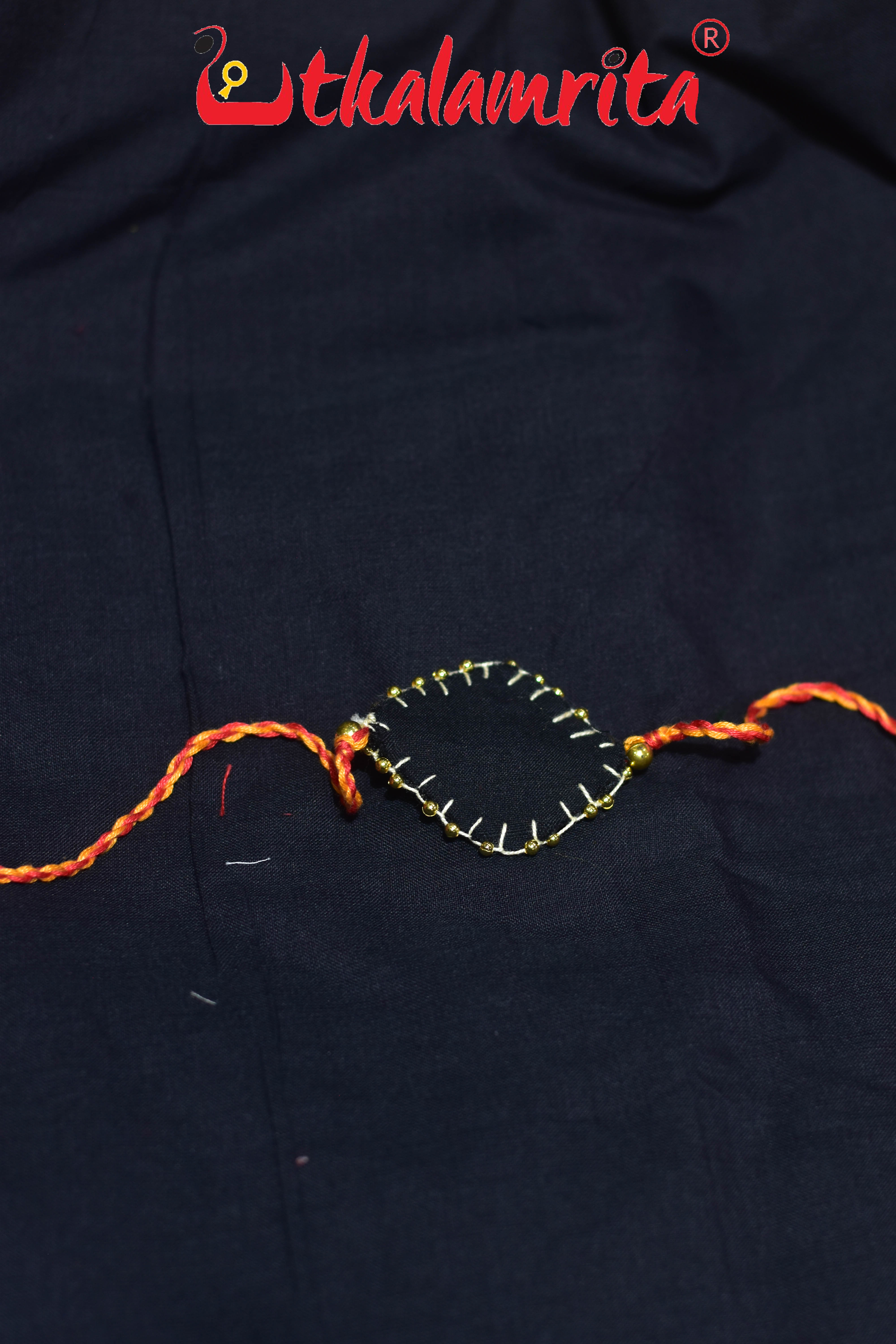 Black Chandrika Golden Mali (Ikat Rakhi)