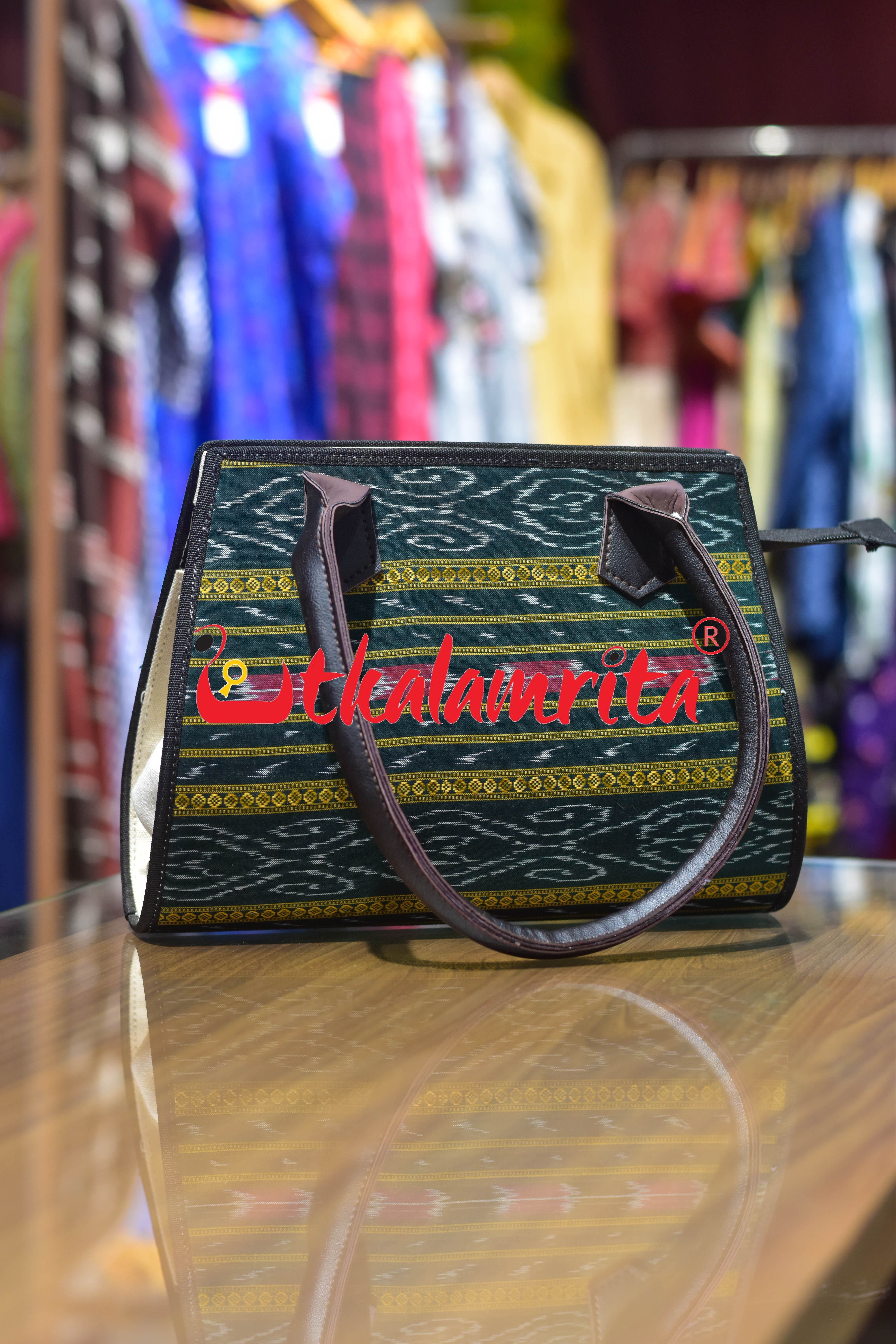 Green Anjimala Trapezium Vanity Bag