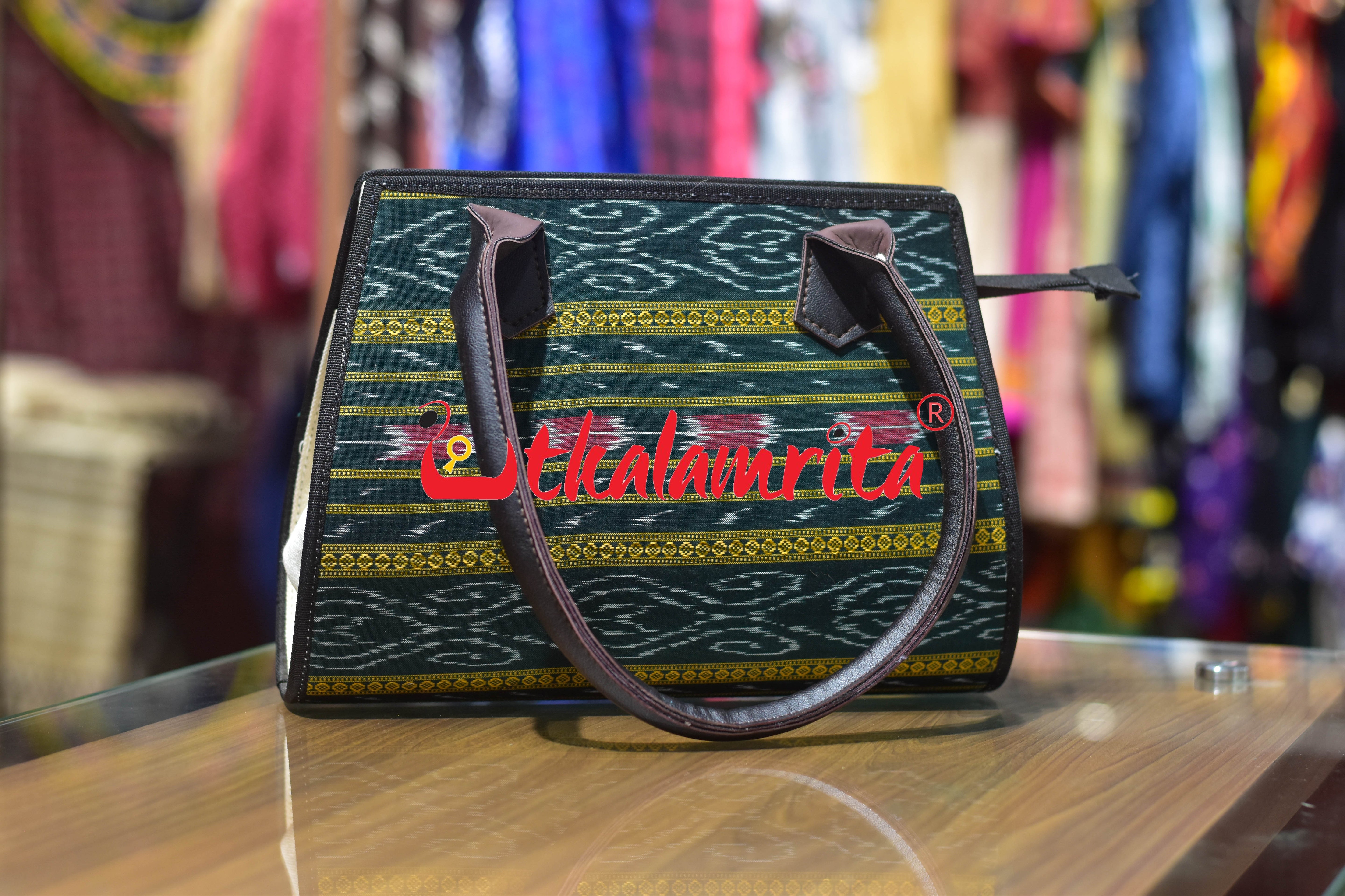 Green Anjimala Trapezium Vanity Bag
