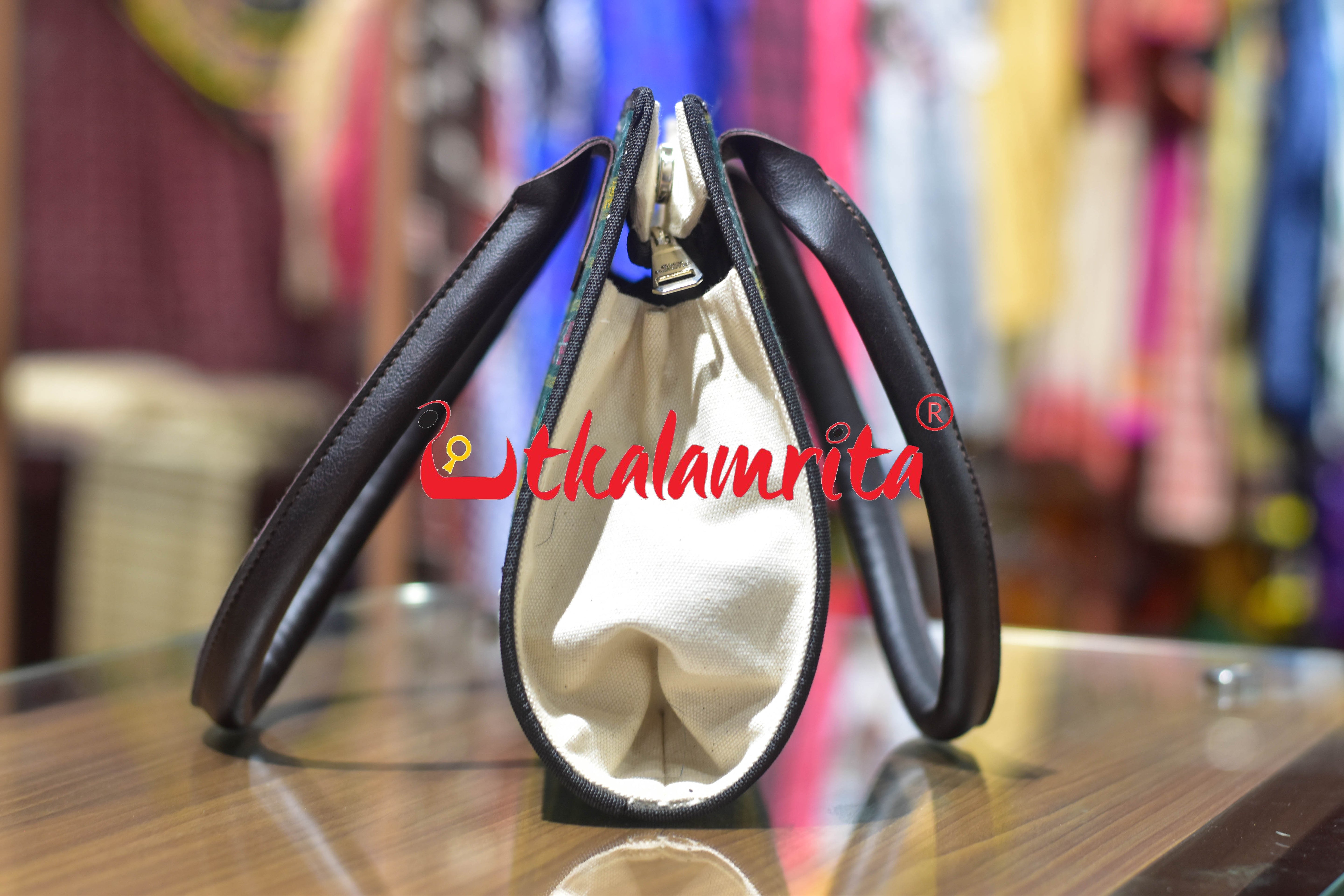 Green Anjimala Trapezium Vanity Bag