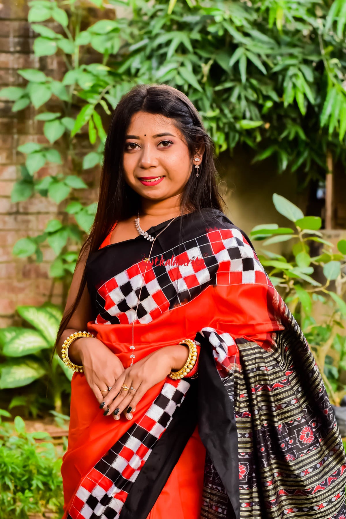 Pasapali Border Orange Silk Saree